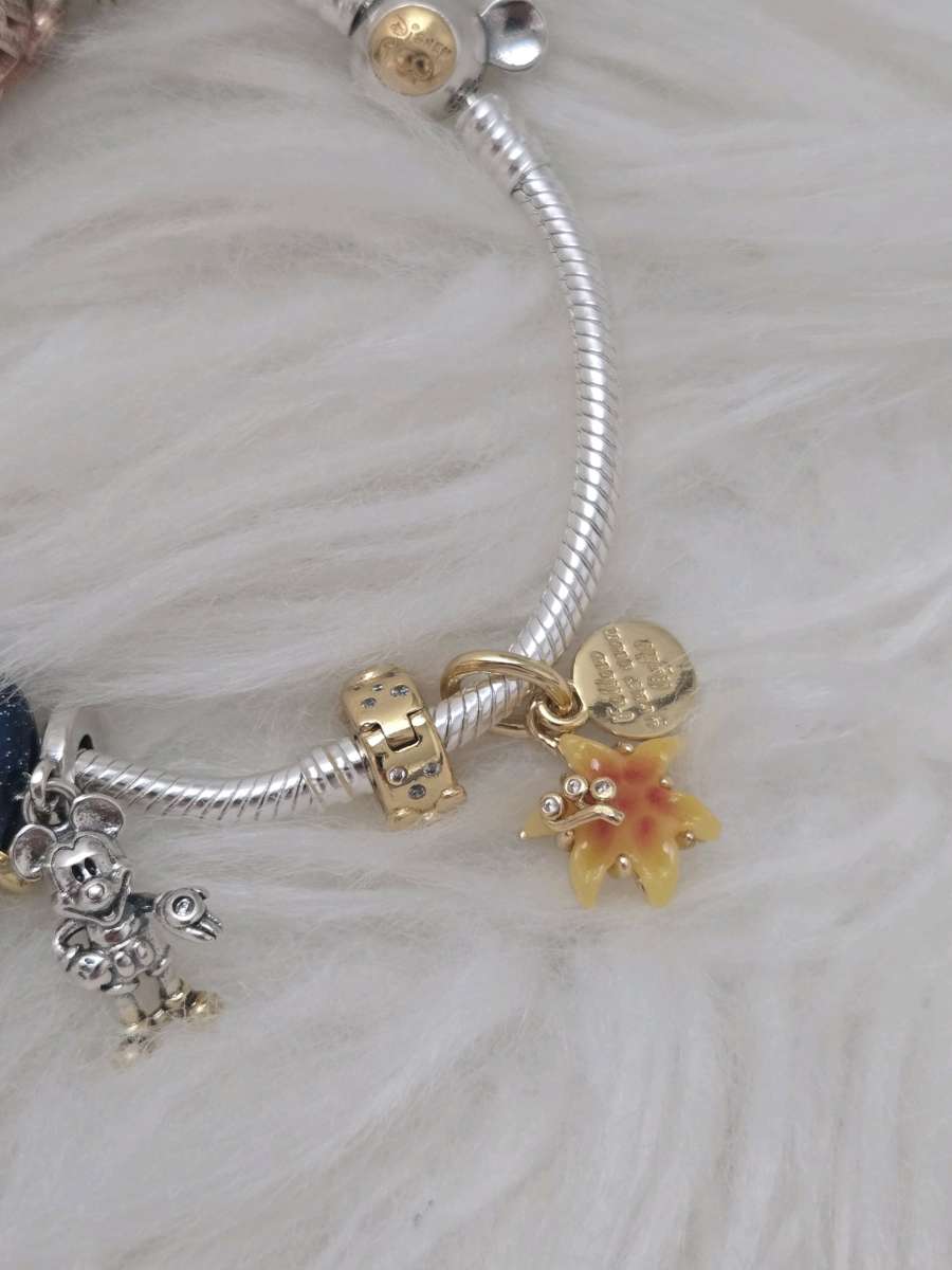 pandora 14k  Disney Tangled Sundrop Flower Glow in D