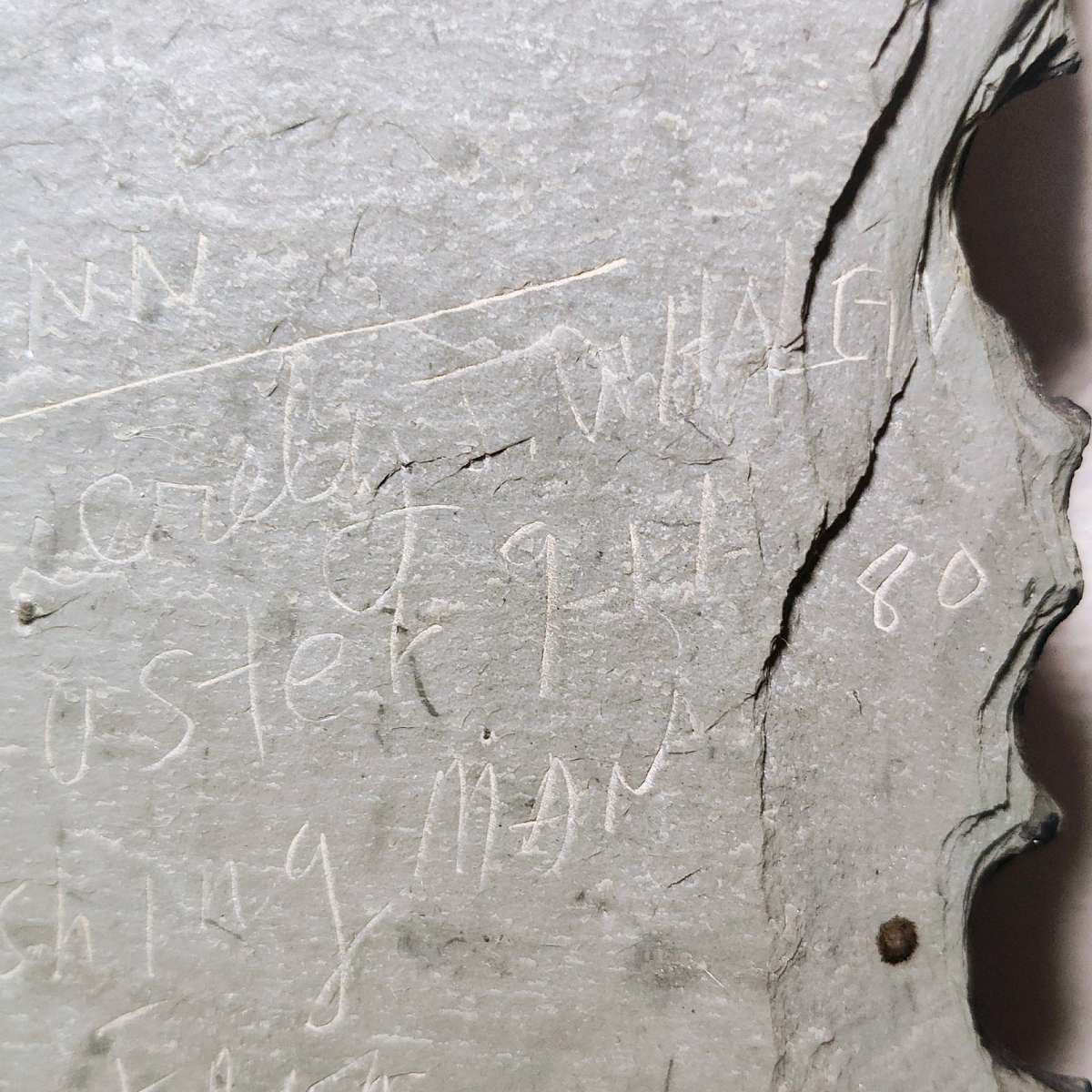 Slate drawing of a Wharf Fisherman