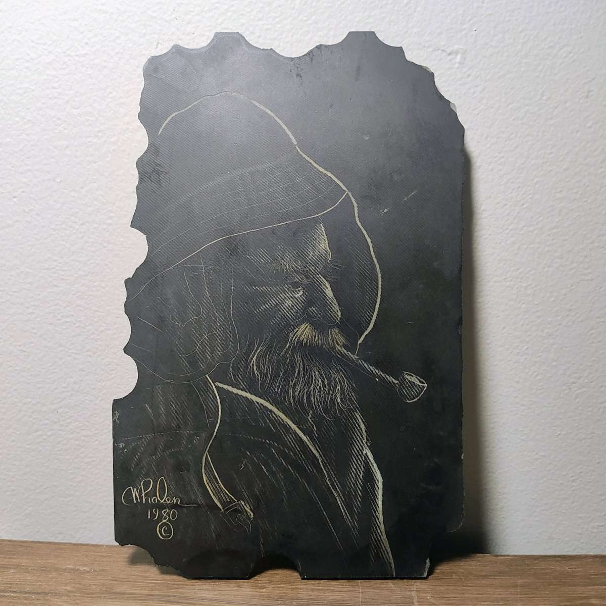 Slate drawing of a Wharf Fisherman