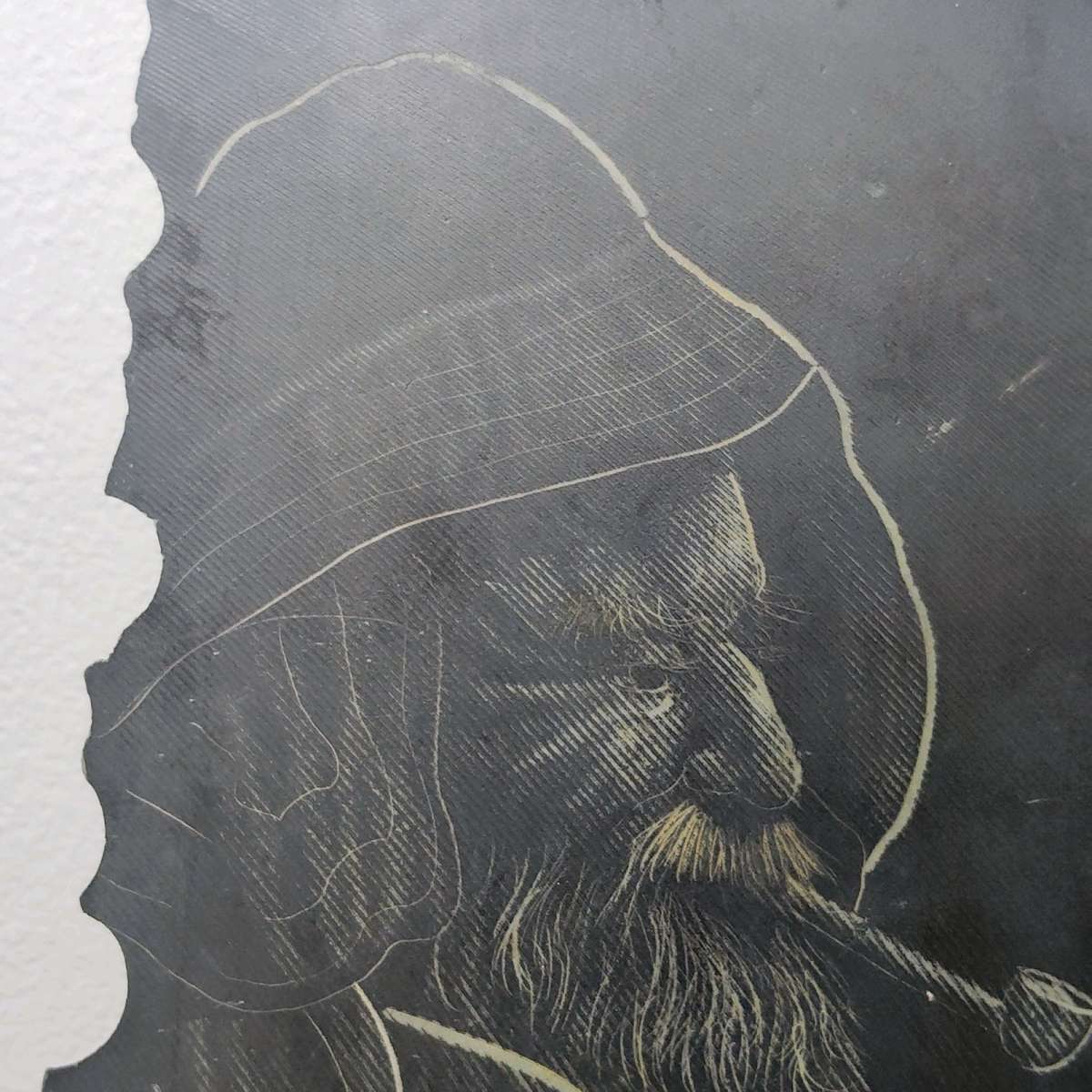 Slate drawing of a Wharf Fisherman