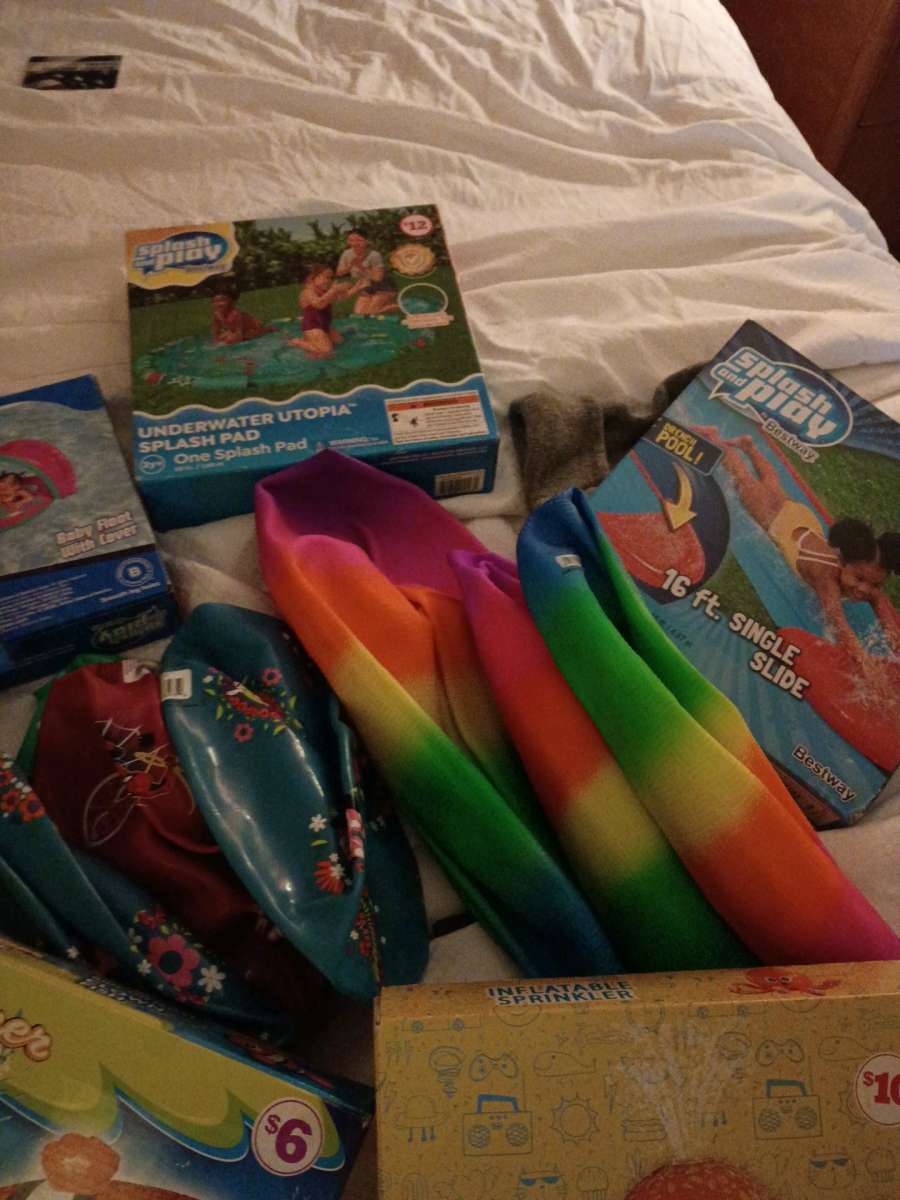 childrens sprinklers floats beach balls water slides