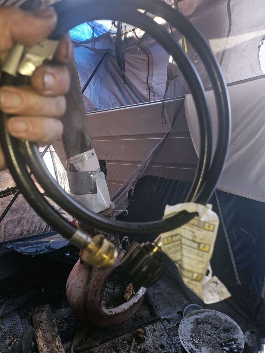 propane heater  and hook up that connects to a big tank