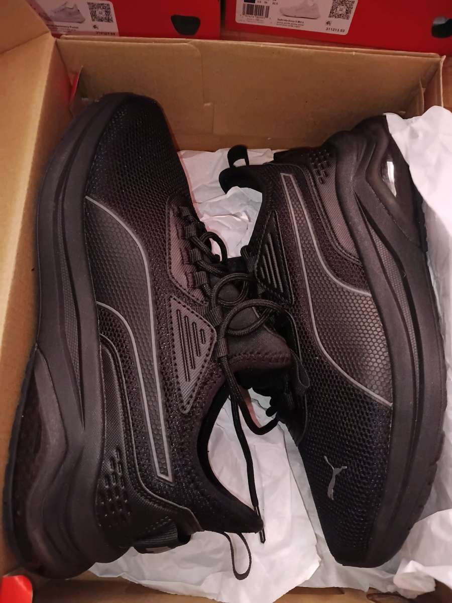 pumas and adidas sneakers