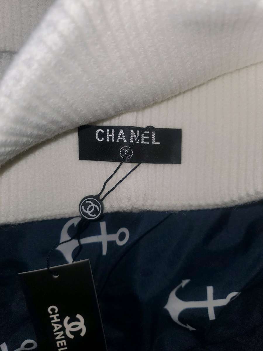 CHANEL White Beanie With Gold Emblems