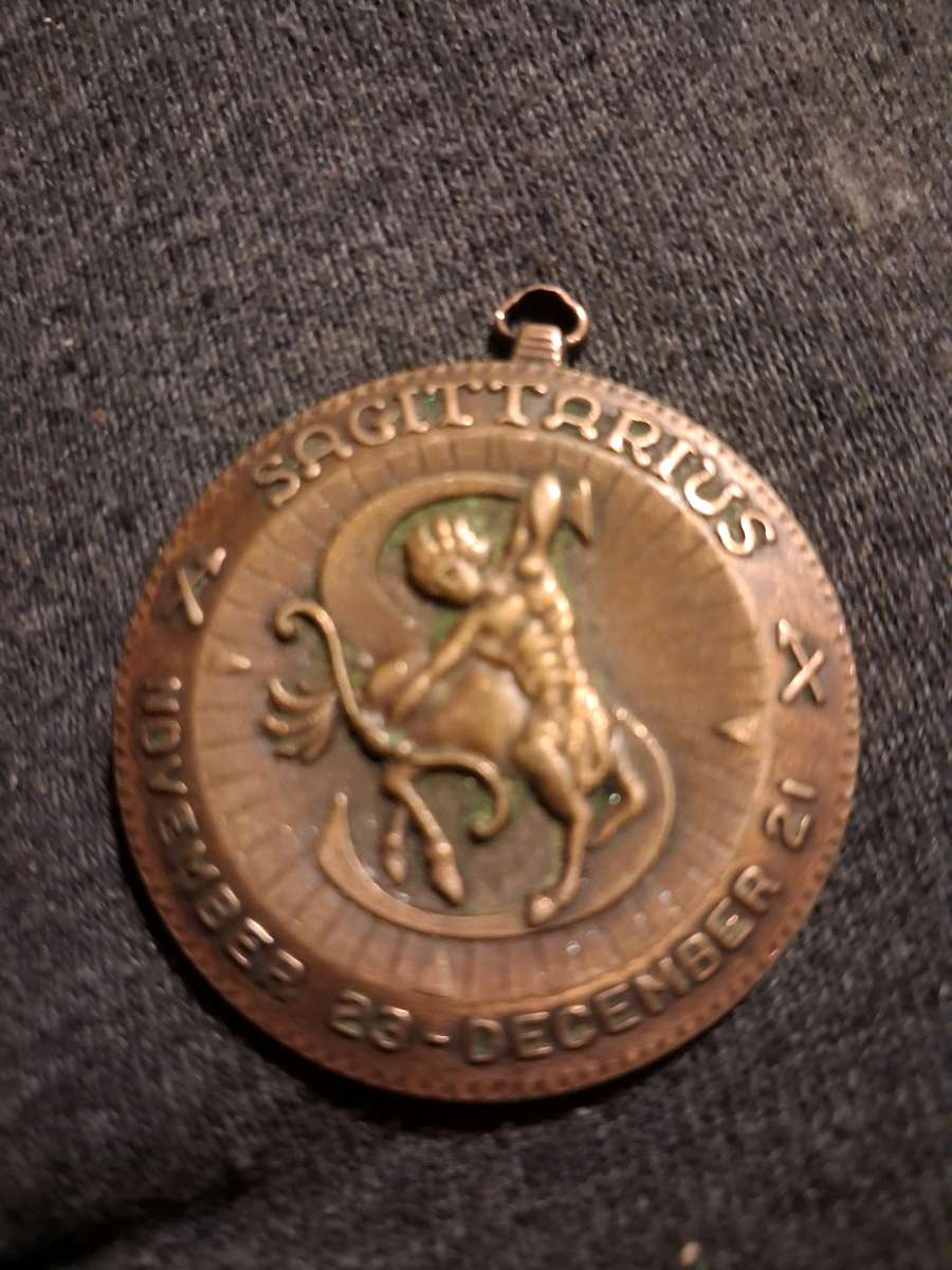 zodiac pendent