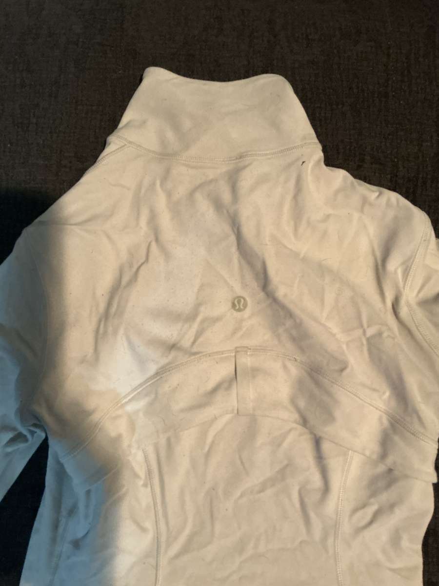 gold and white lululemon jacket