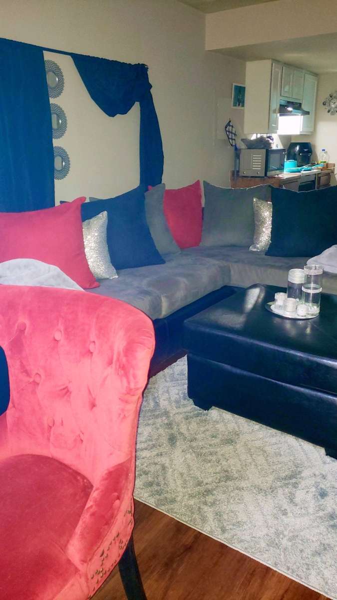 Black leather an grey sectional