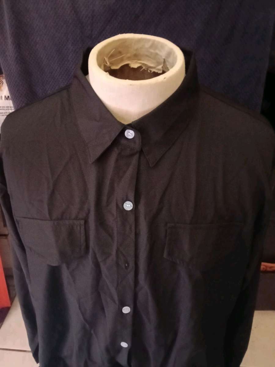 Black long sleeve shirt with buttons