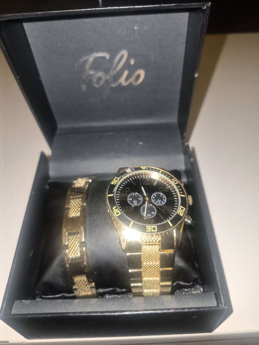 gold And Black Watch And Bracelet