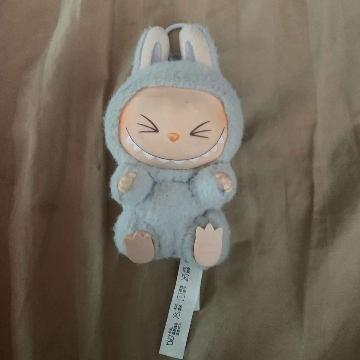 labubu gray have a seat