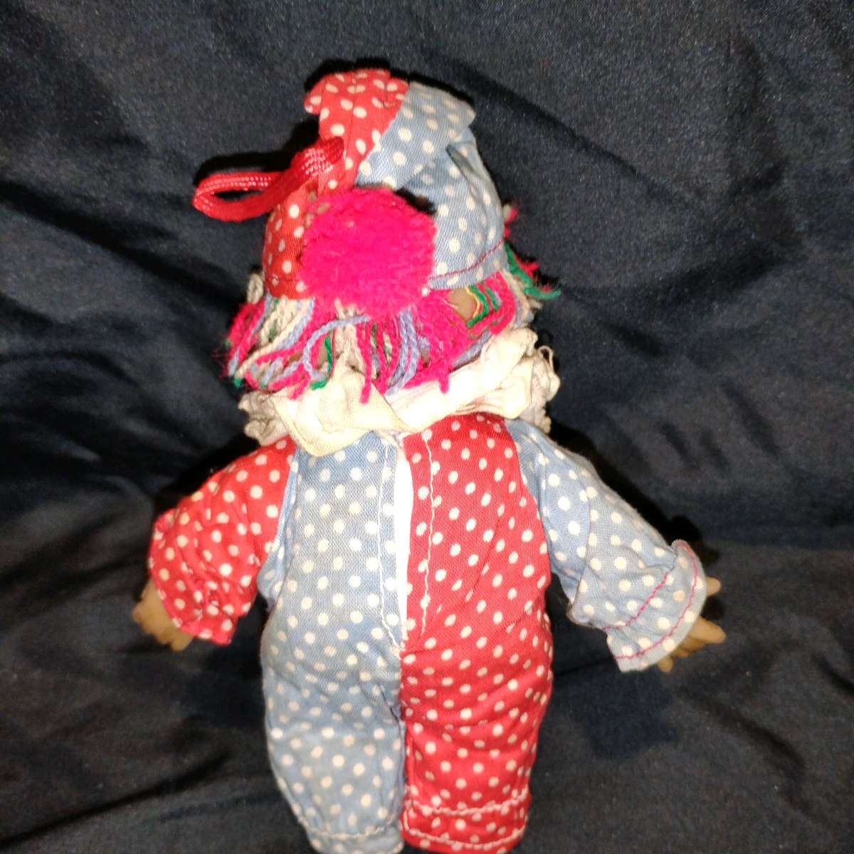 this is a vintage collectible clown doll cloth body vinyl he