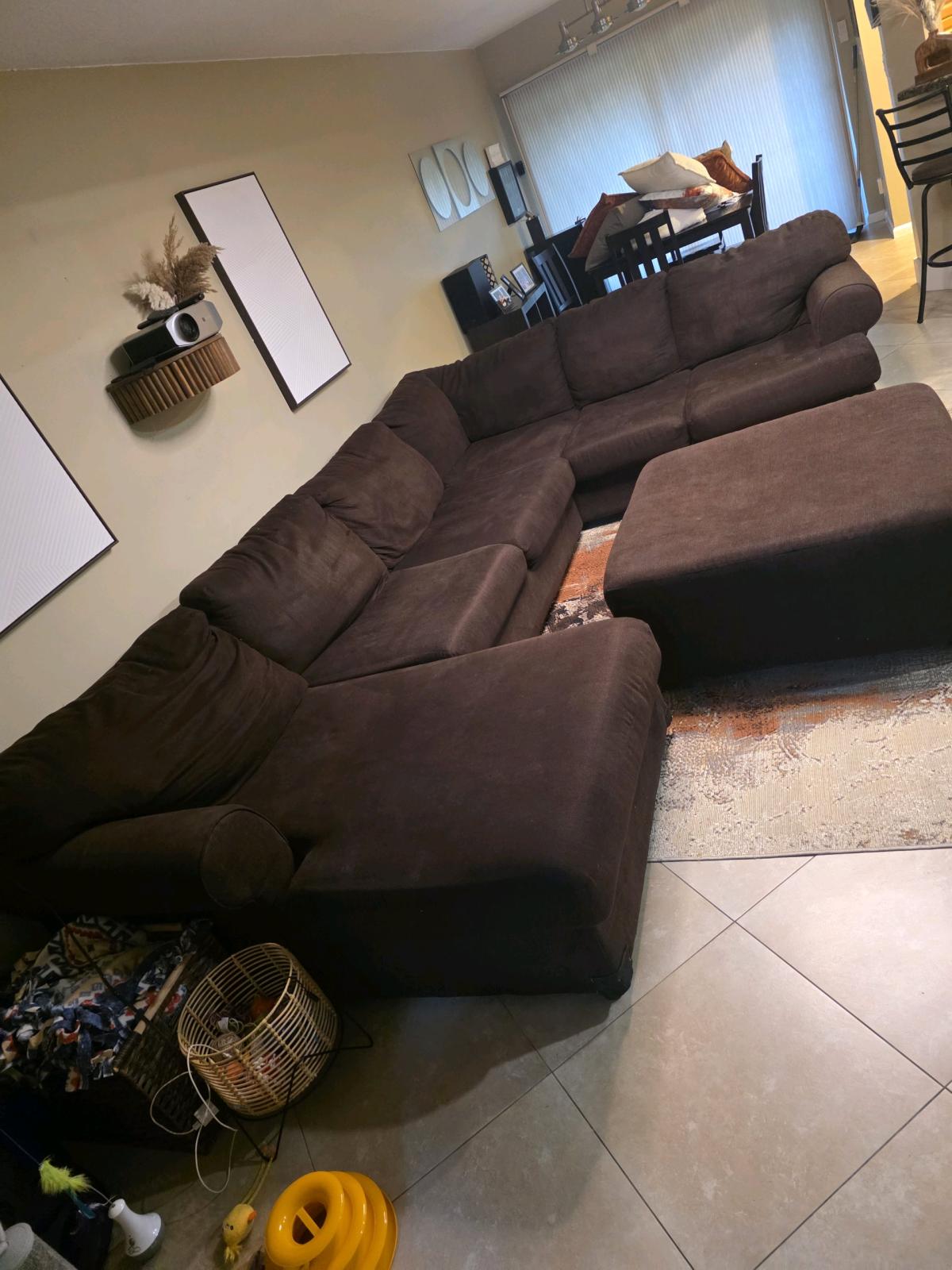 brown sectional sofa with ottman