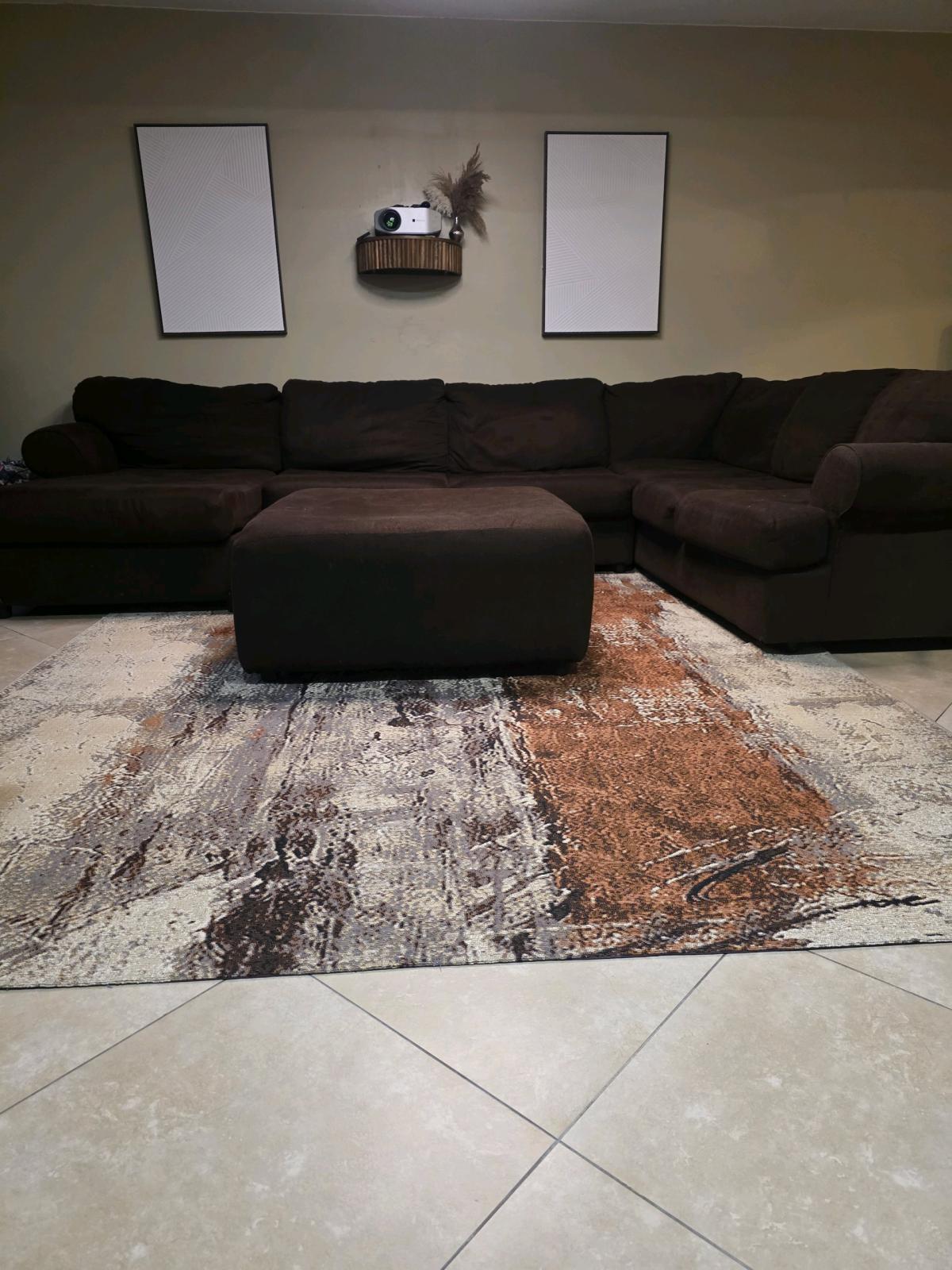 brown sectional sofa with ottman