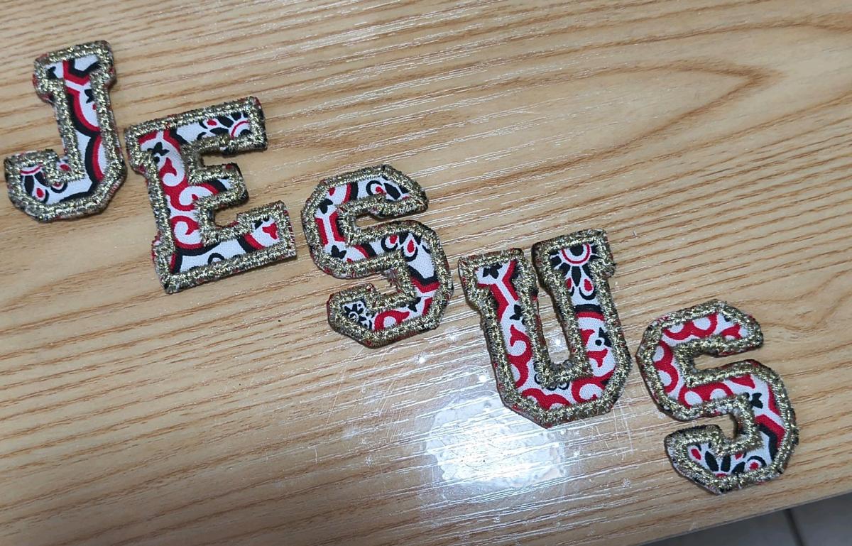 Embroidery the name of Jesus
