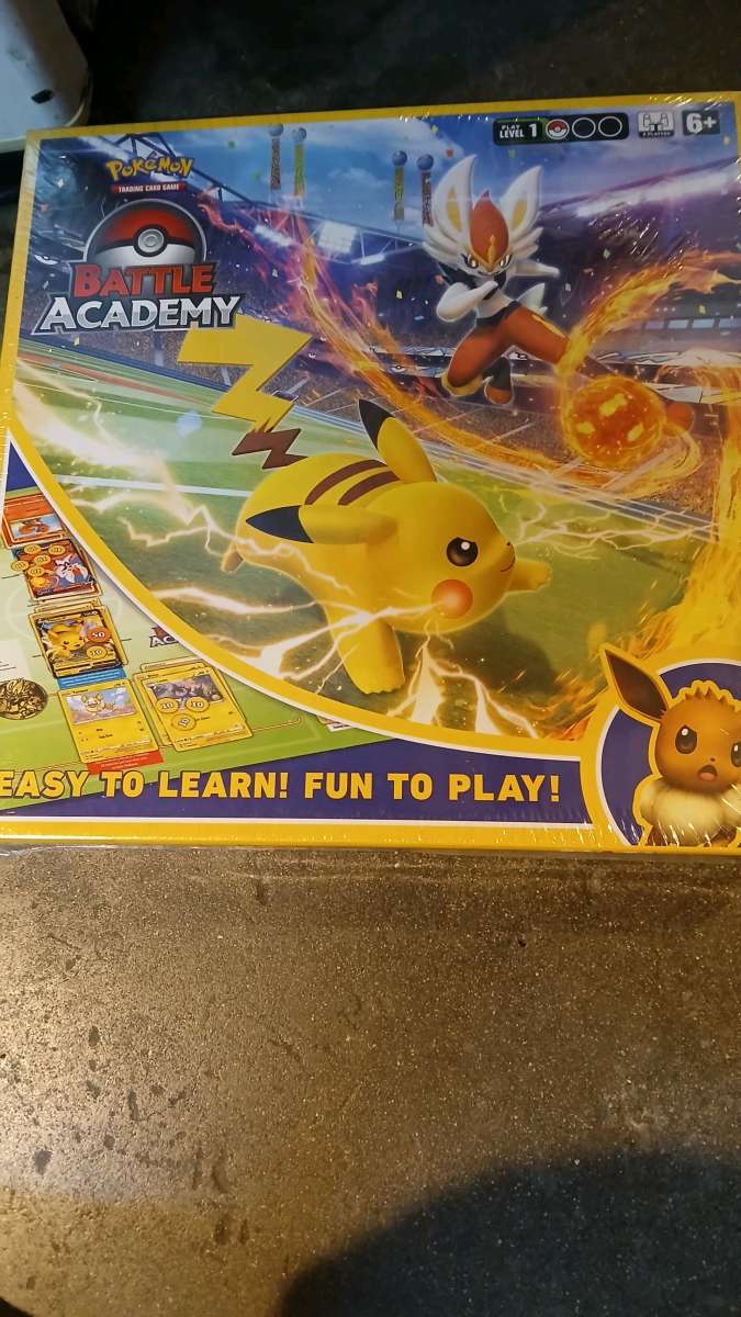 pokemon sealed game and figure set