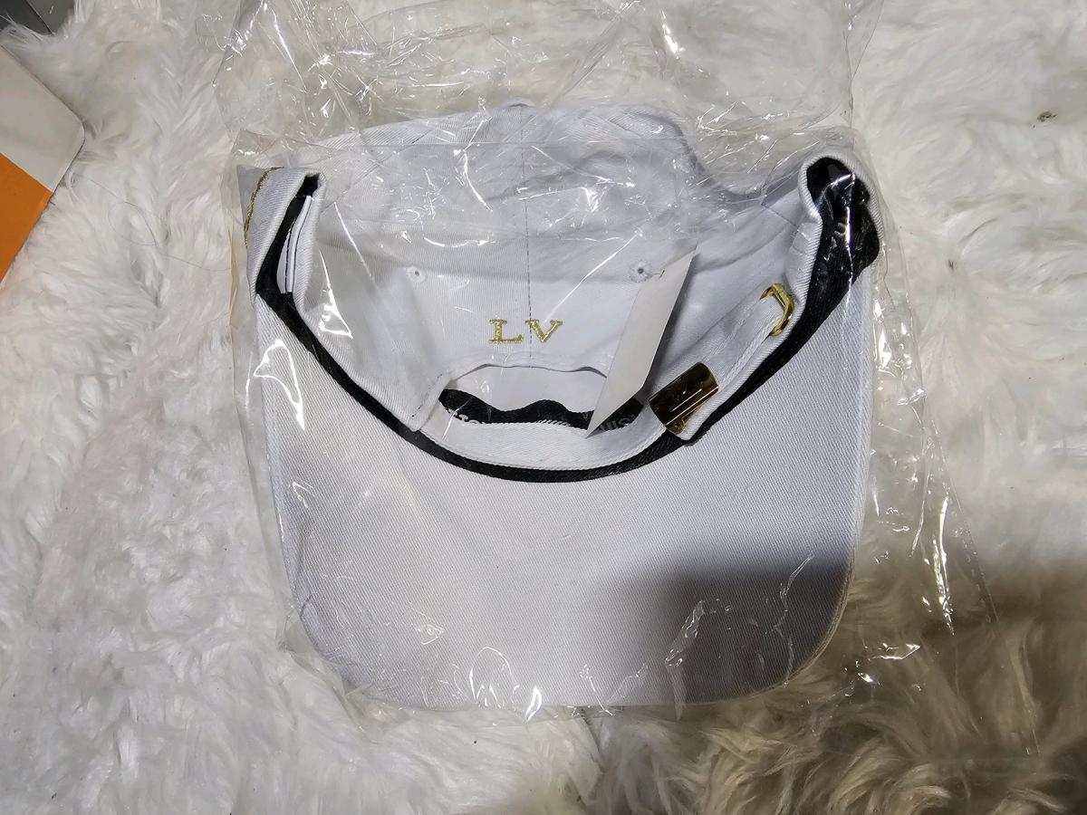WHITE N GOLD LOUIS VUTTON LOGO HAT