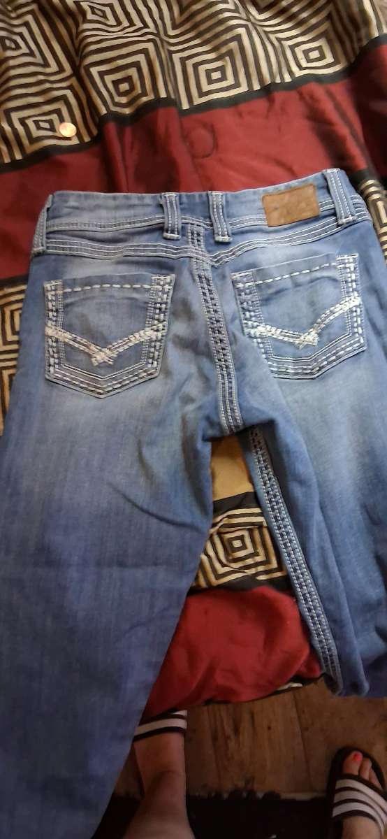 Size 26 Buckle Jeans