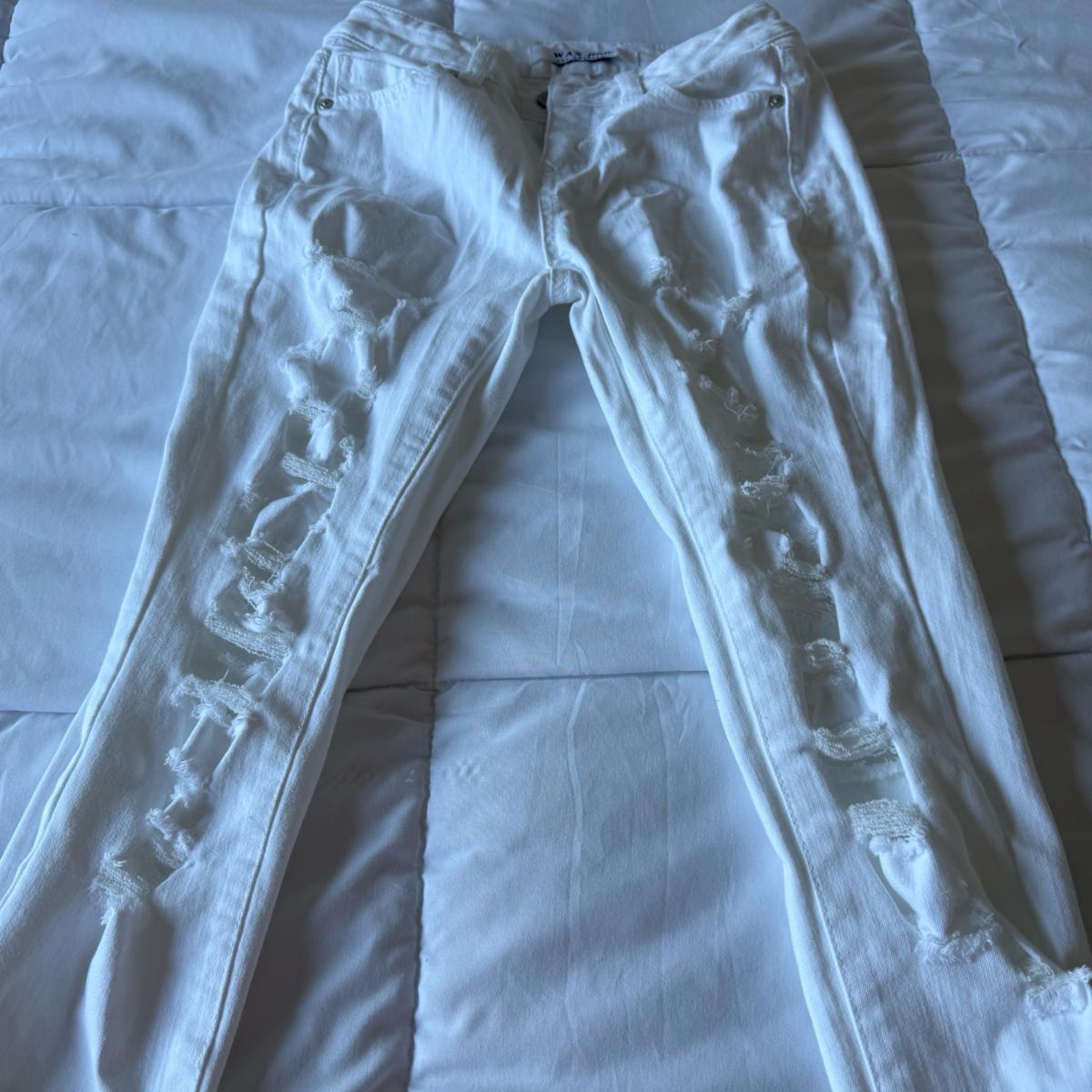 Pair of WAX JEANS white distressed skinny jeans made in USA