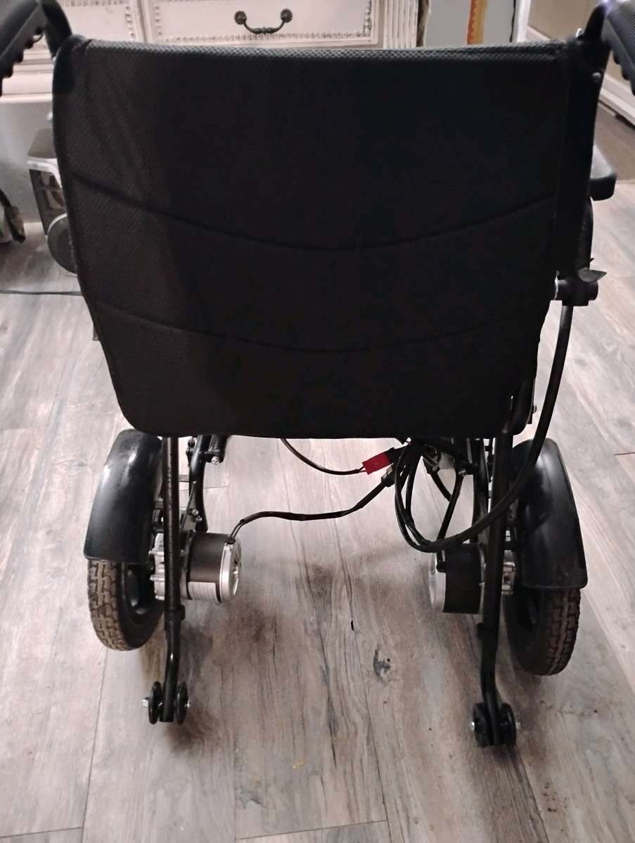 Motorized Wheelchair with Dual Batteries and Charger