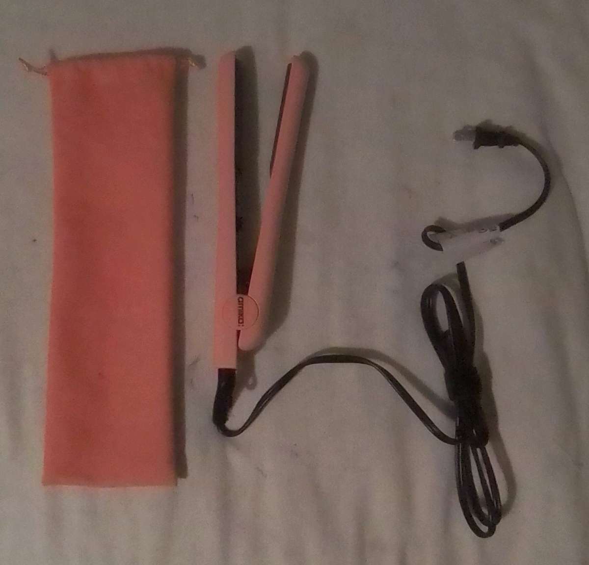 orange and black curling iron