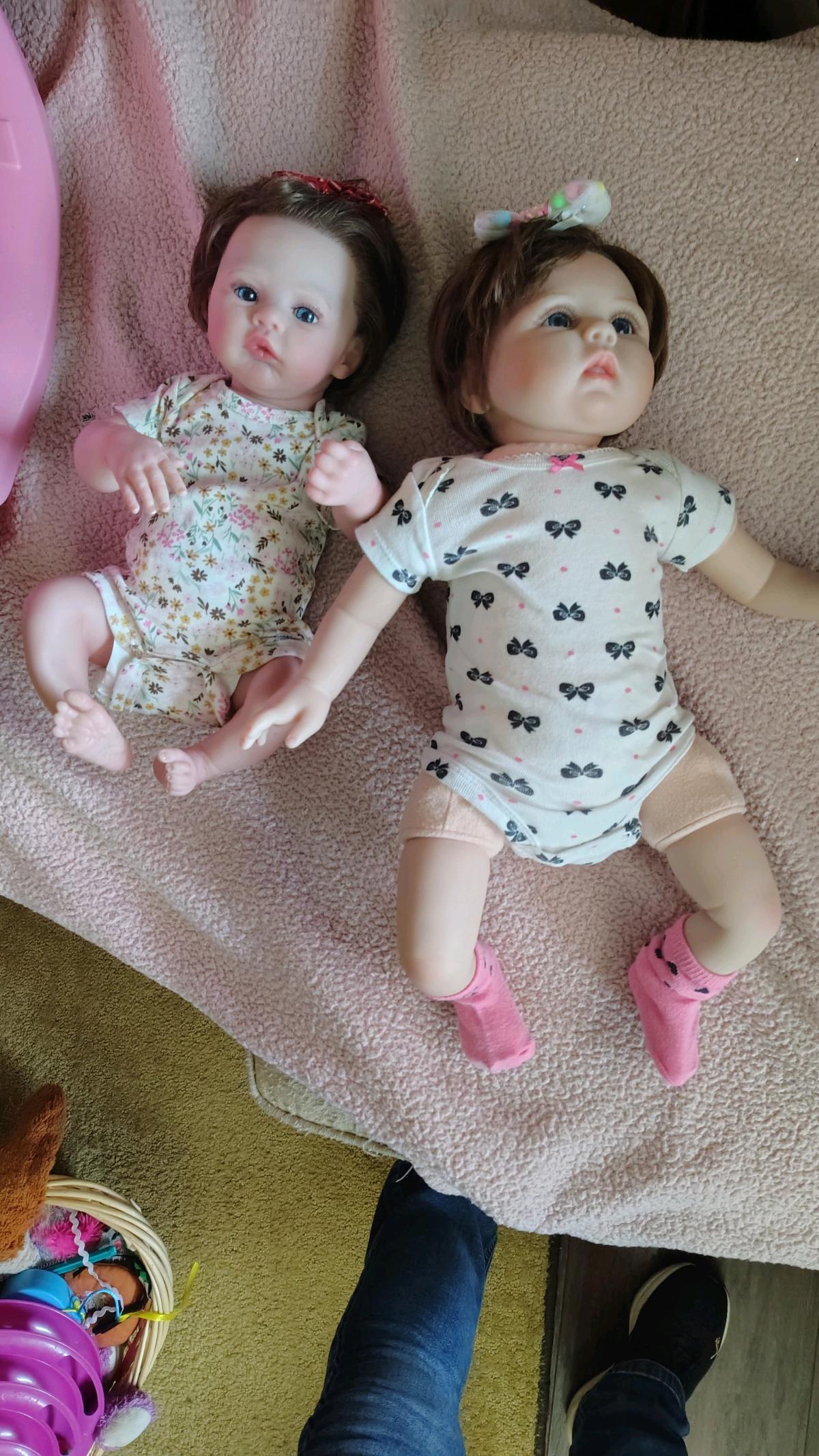 Reborn baby dolls with car seat  playpen  bassinet more