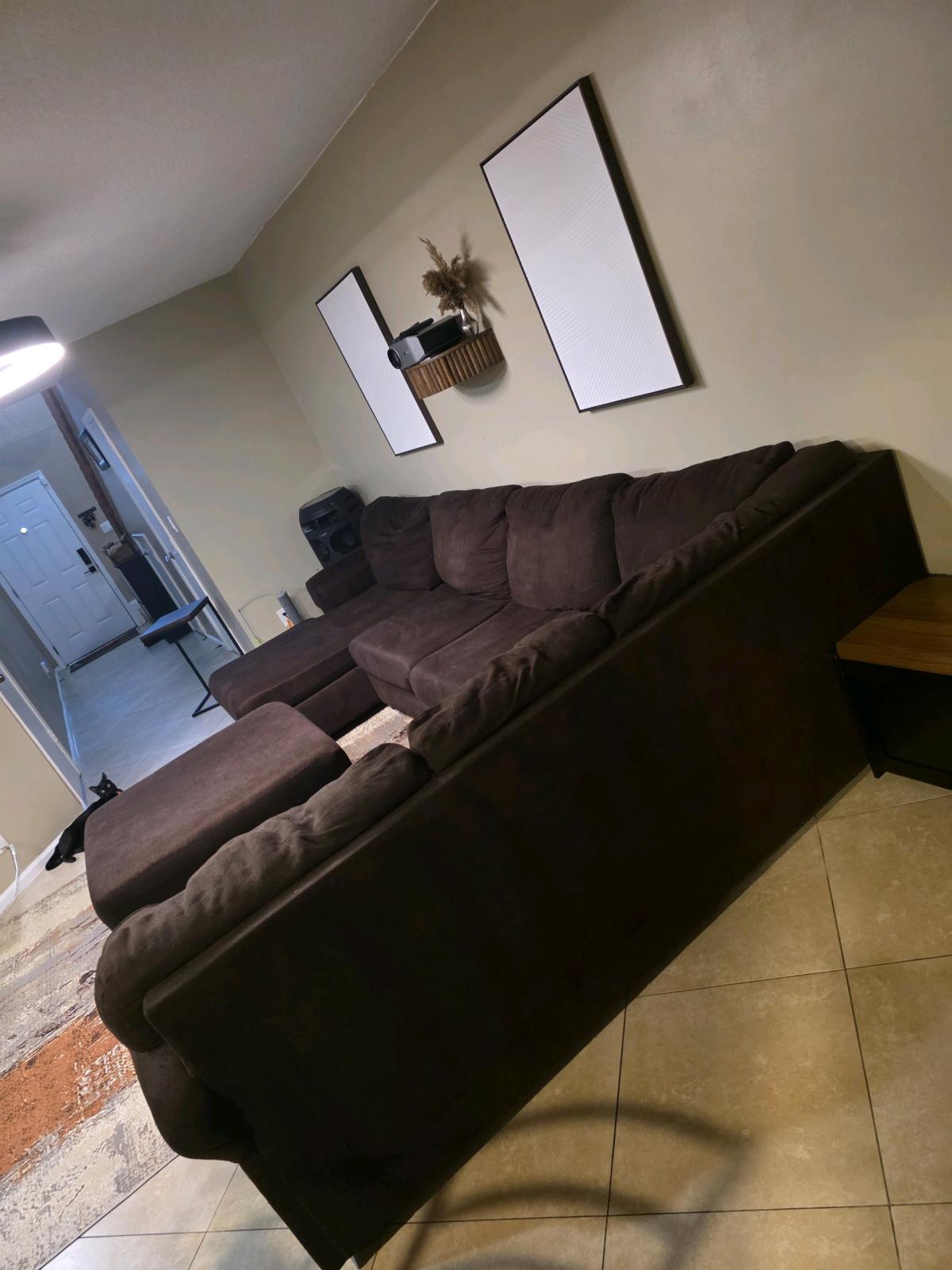 brown sectional sofa with ottman