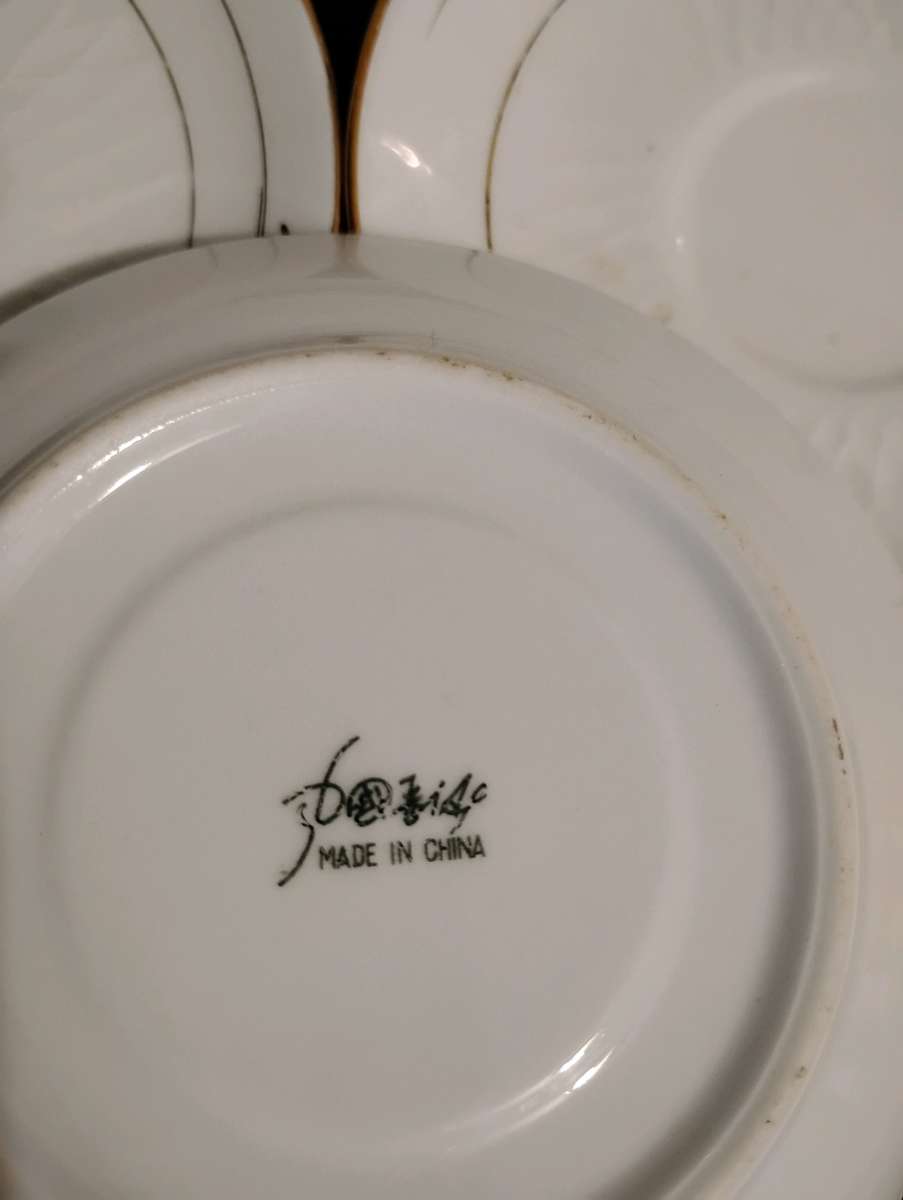 Set of 5 white with gold trim teacup saucers