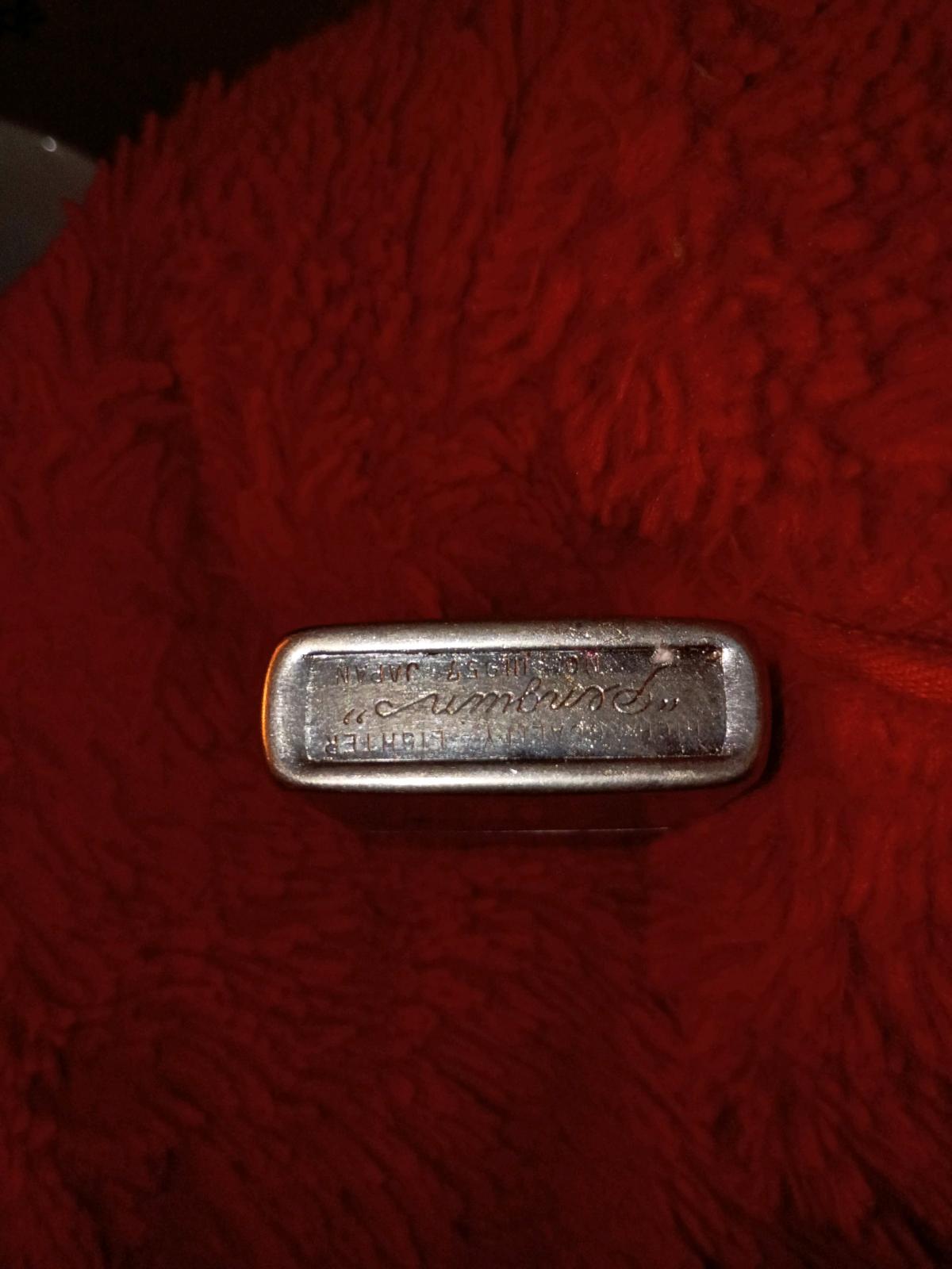 vintage penguin fluid lighter from japan