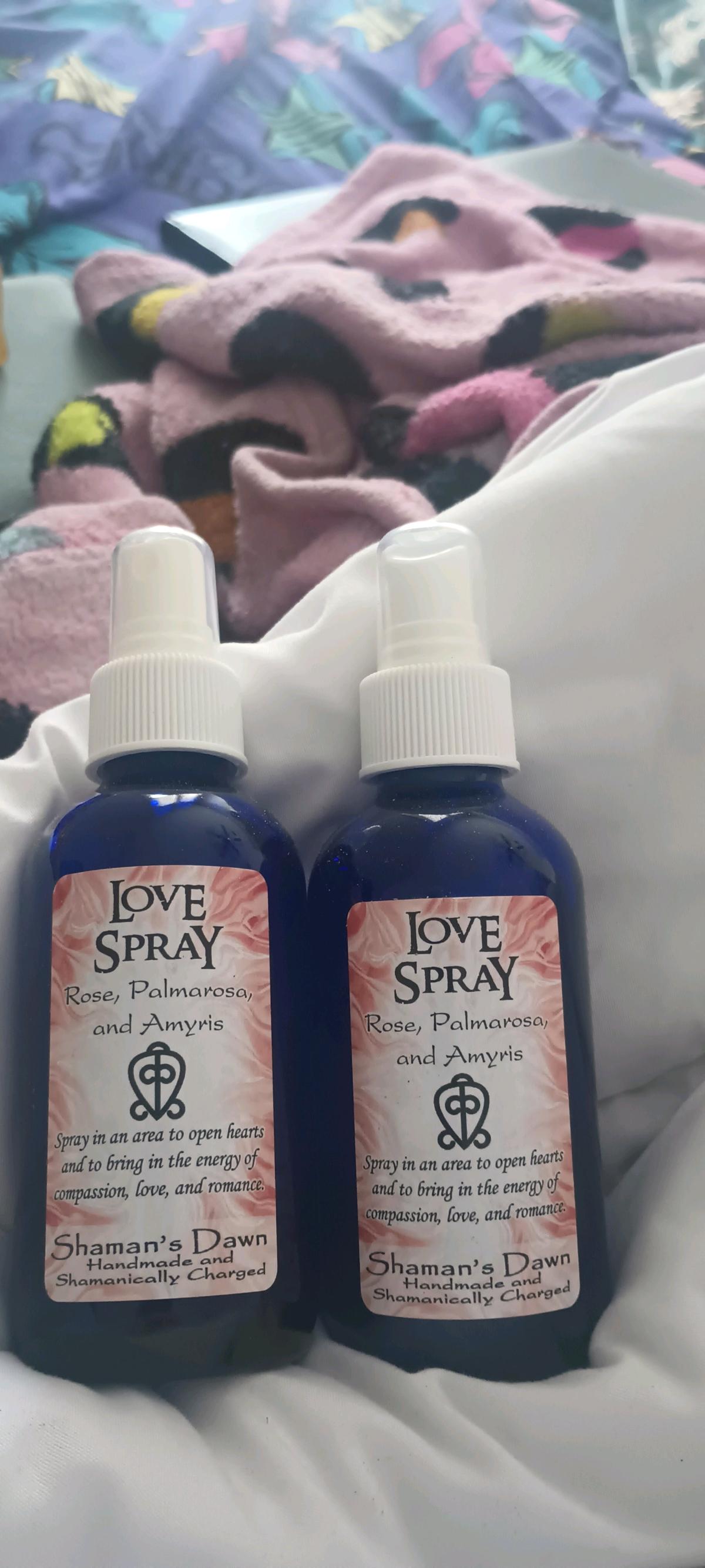 2 Love sprays in blue glass bottles
