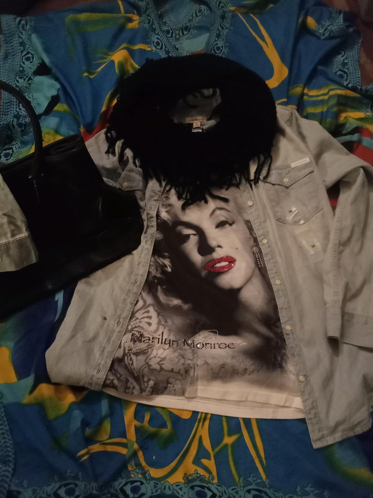 Marilyn Monroe Calvin Klein over shirt paired with Coach Bag