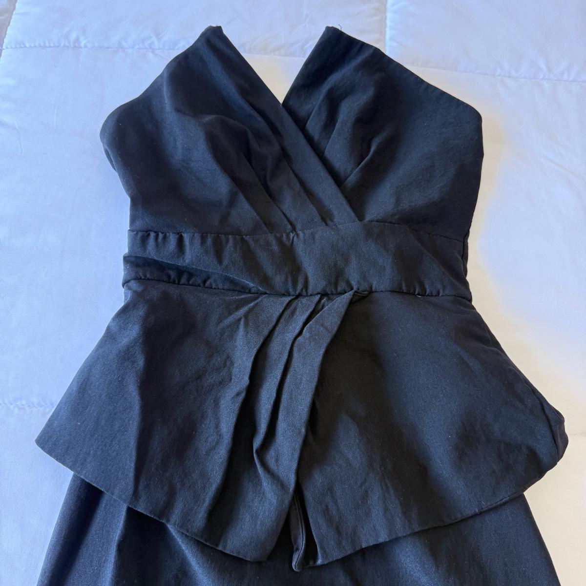 Elegant Strapless Black CorsetStyle Peplum Cocktail Dress