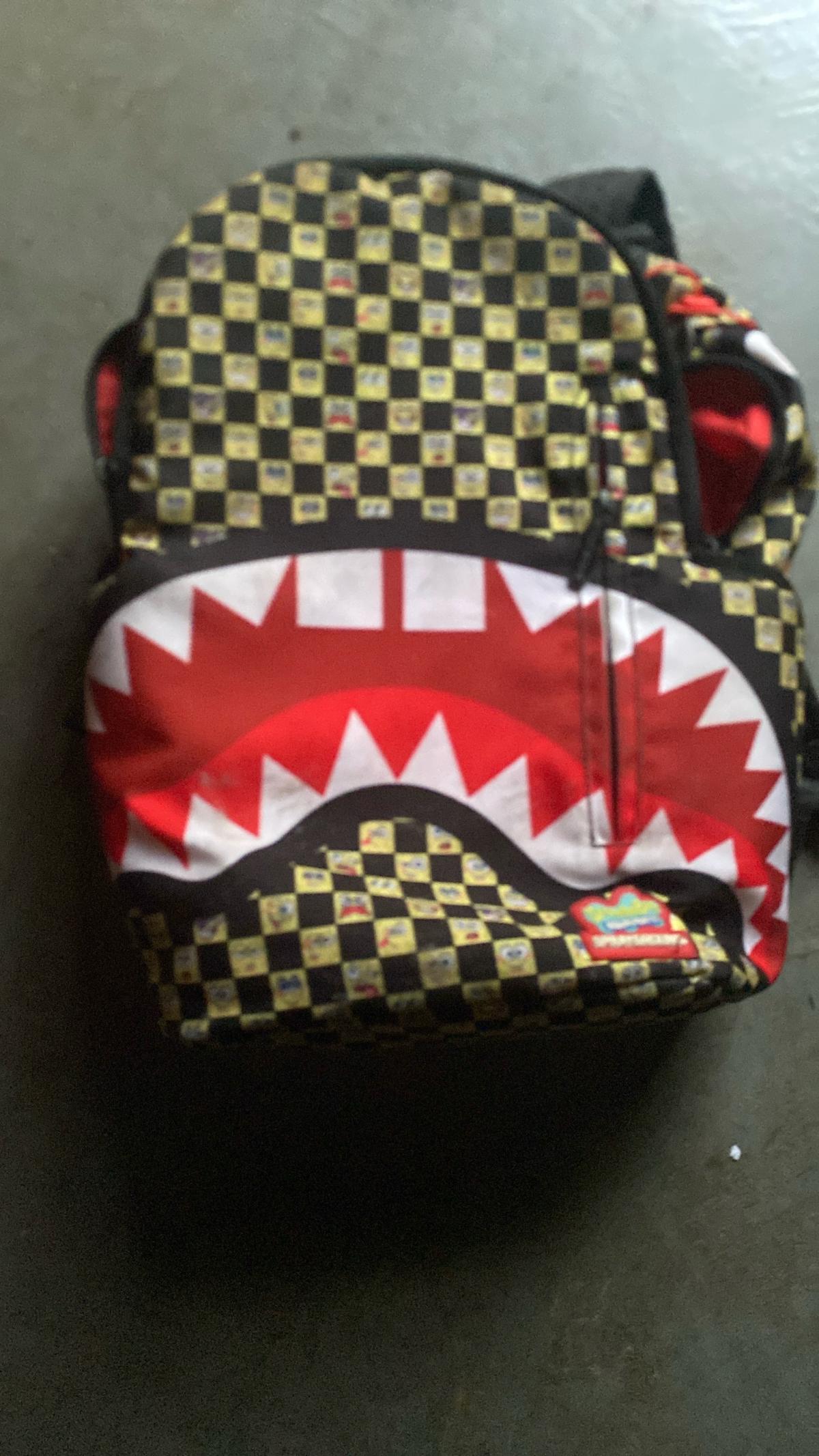 spray ground book bag