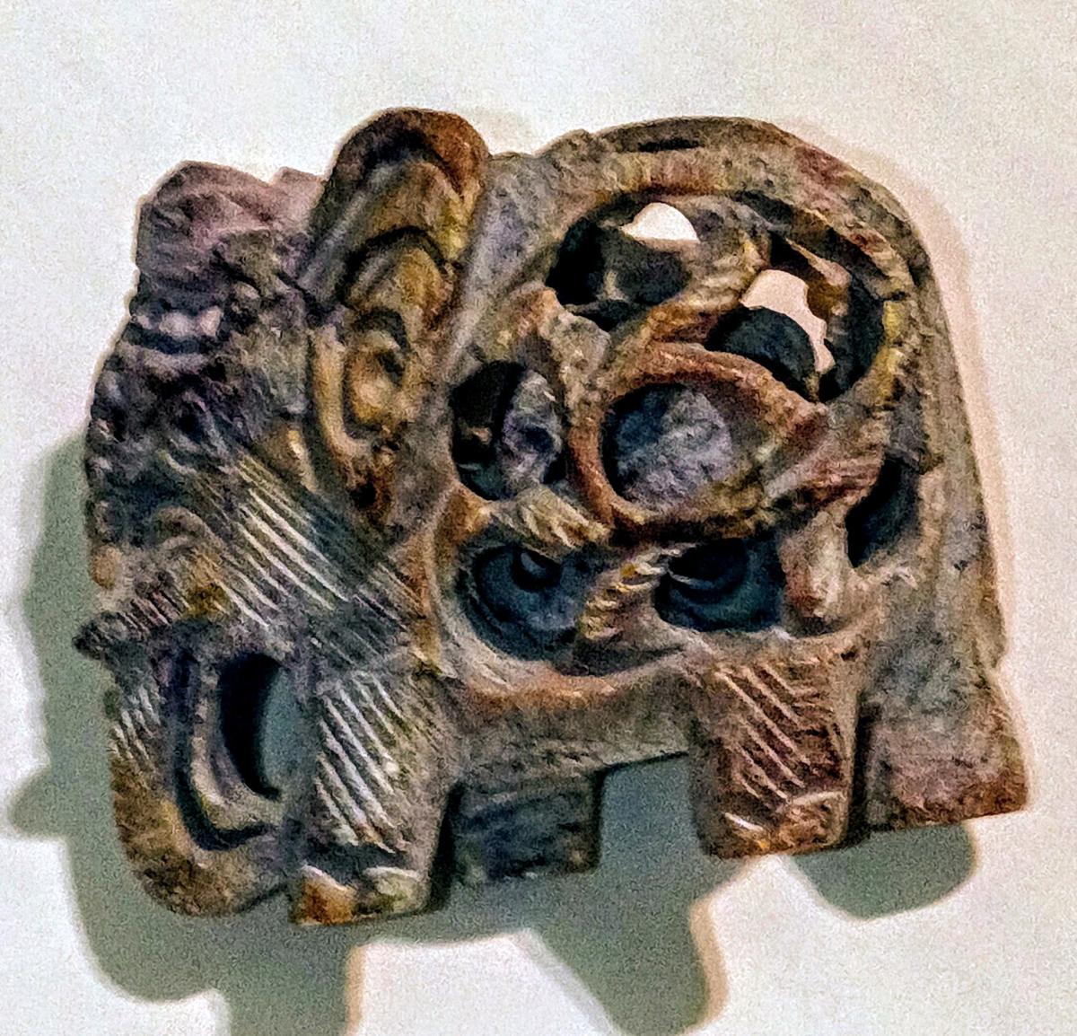 two soap stone elephant with baby elephant inside them