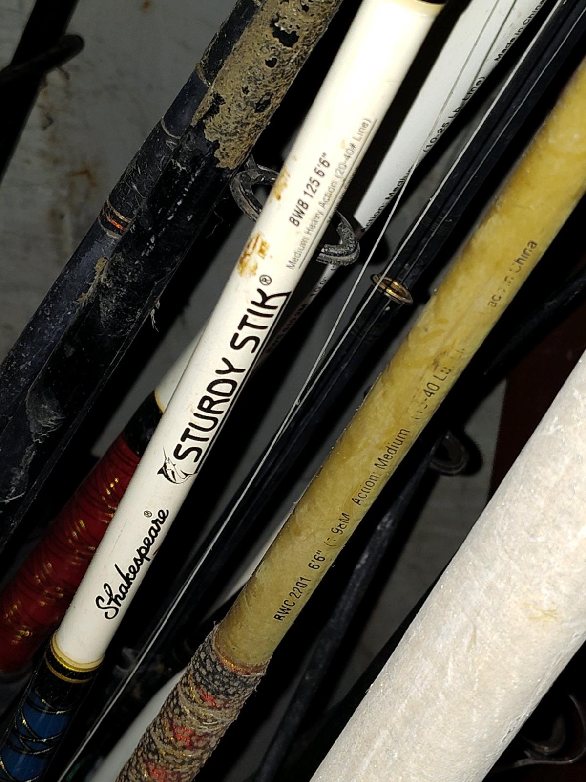15 foot Grumman aluminum canoe fishing poles and tackle kit