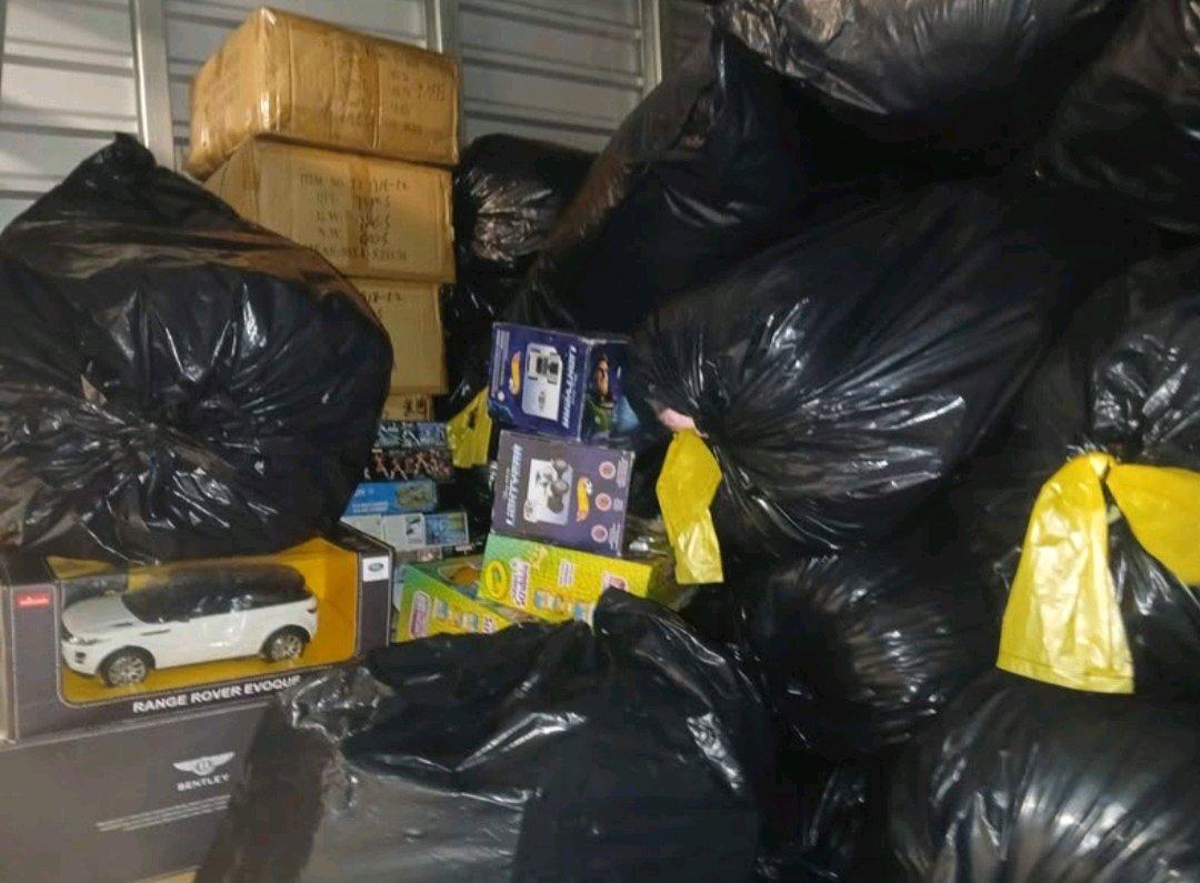 Tons of scarfs toys ect selling evrything shown