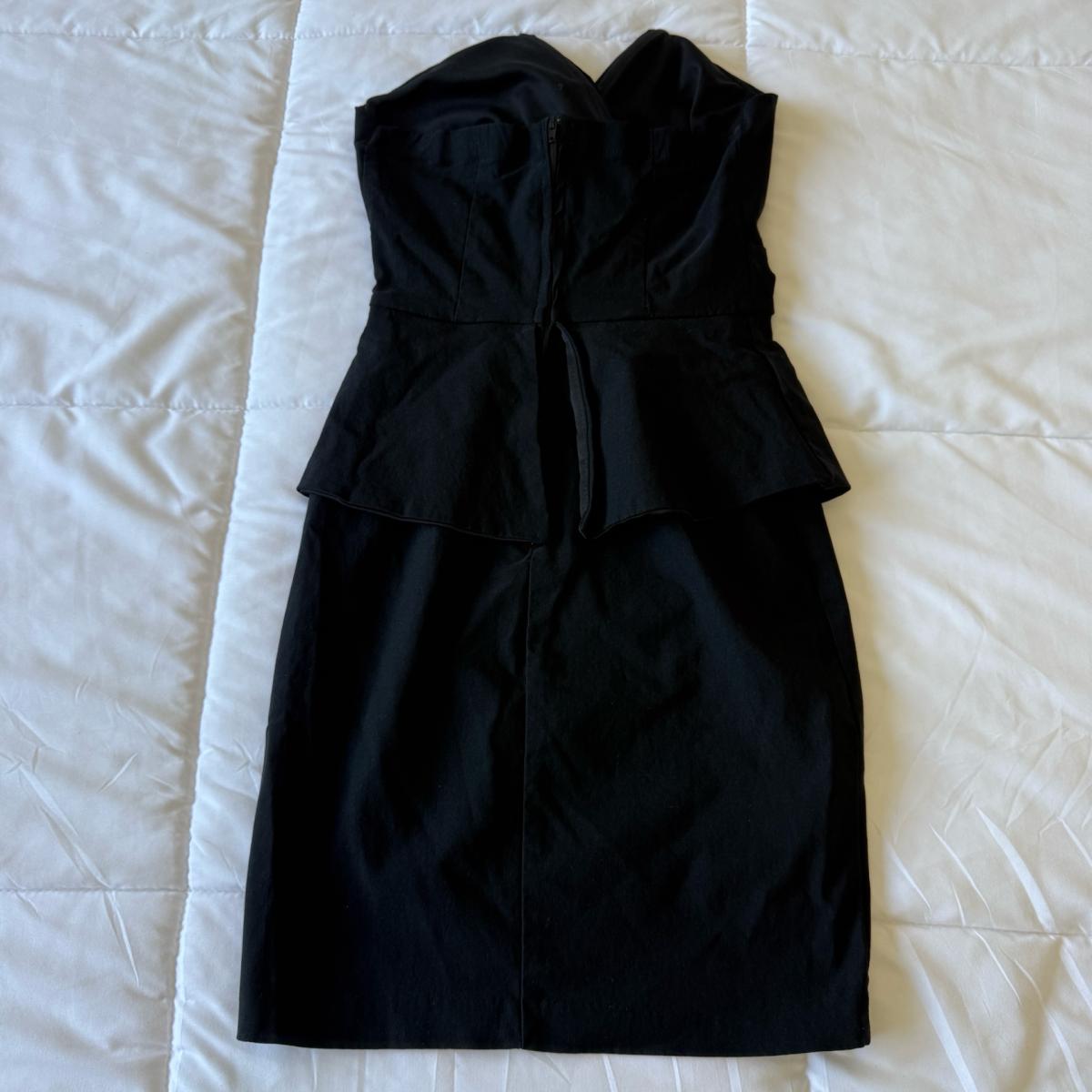 Elegant Strapless Black CorsetStyle Peplum Cocktail Dress