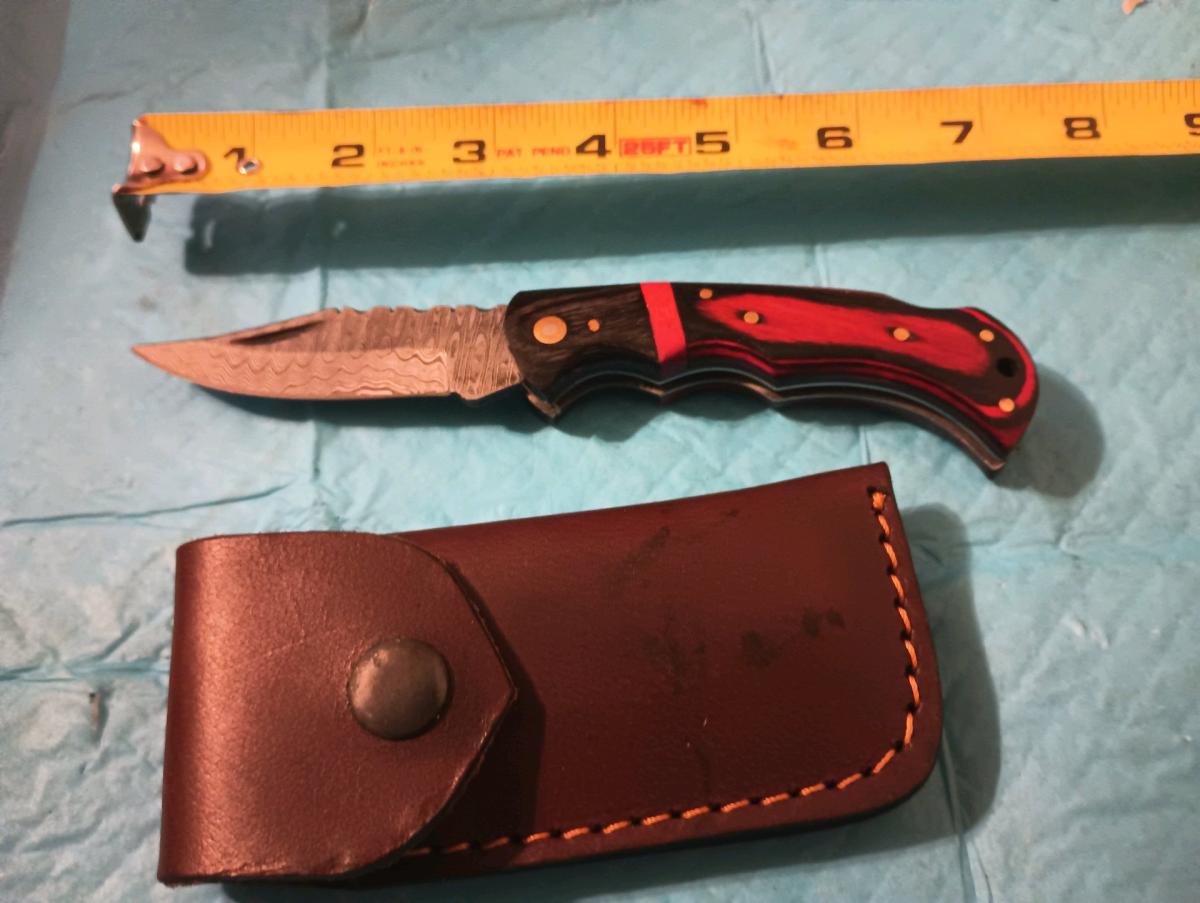 hand forged buck pocket knife with custom leather sheath