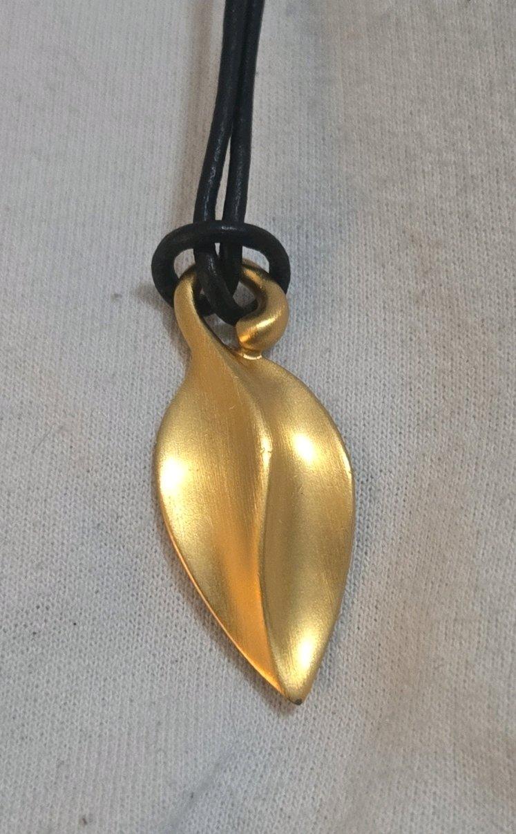 Monet Gold Tone Leaf Pendant Necklace on Black Cord