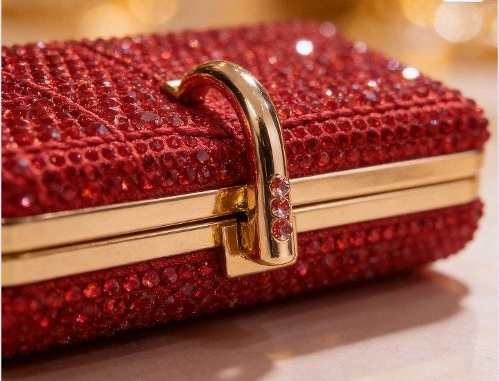 red studded evening clutch