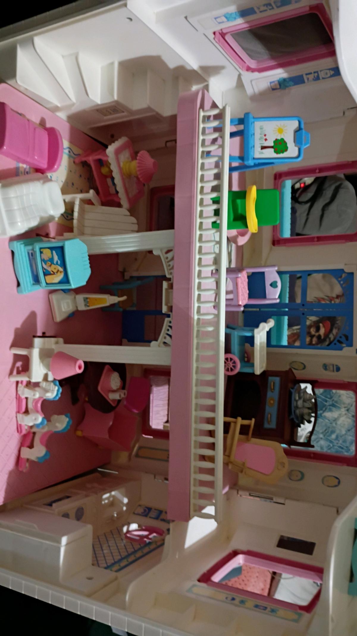 vintage dollhouse with accessories