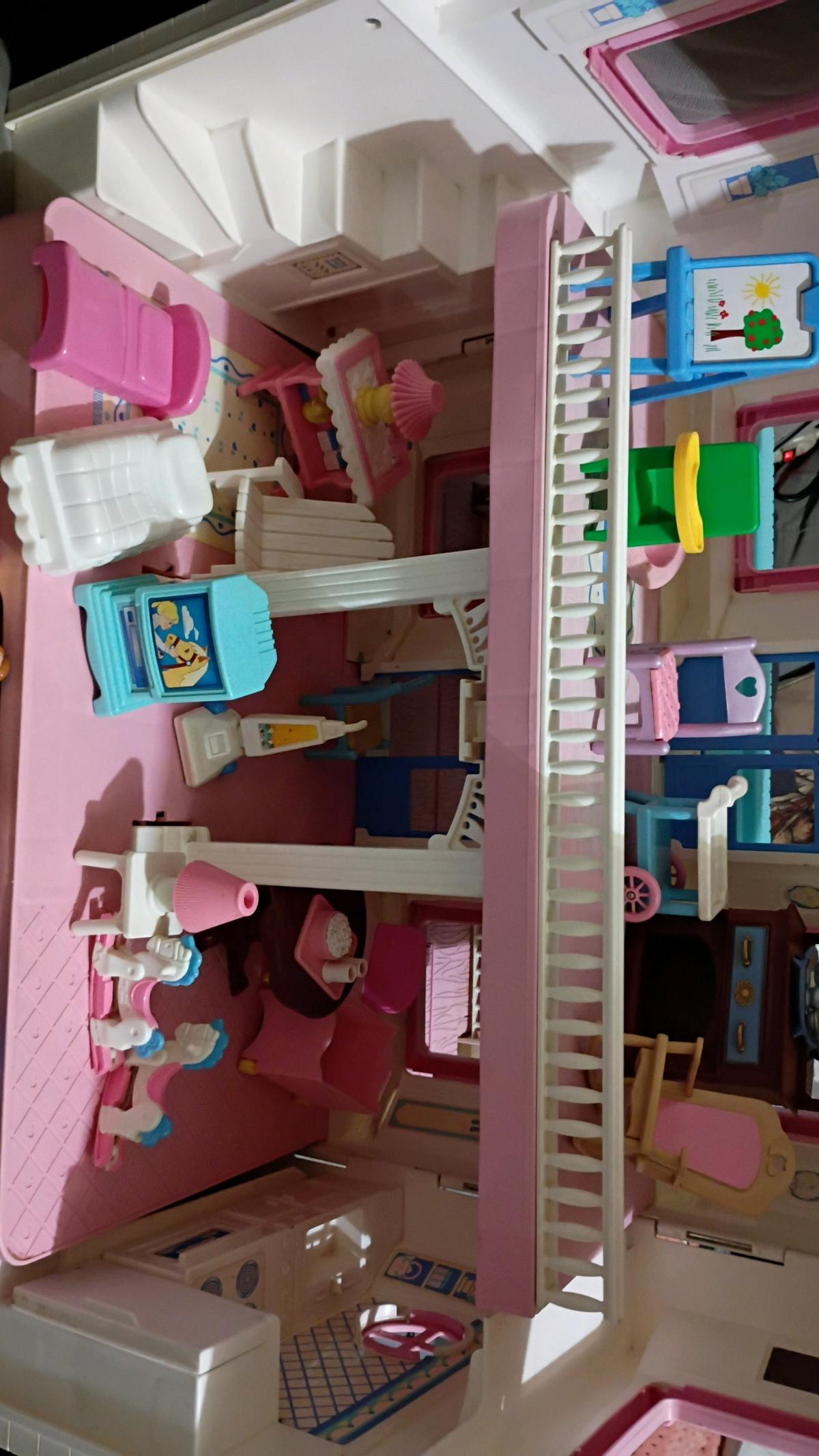 vintage dollhouse with accessories
