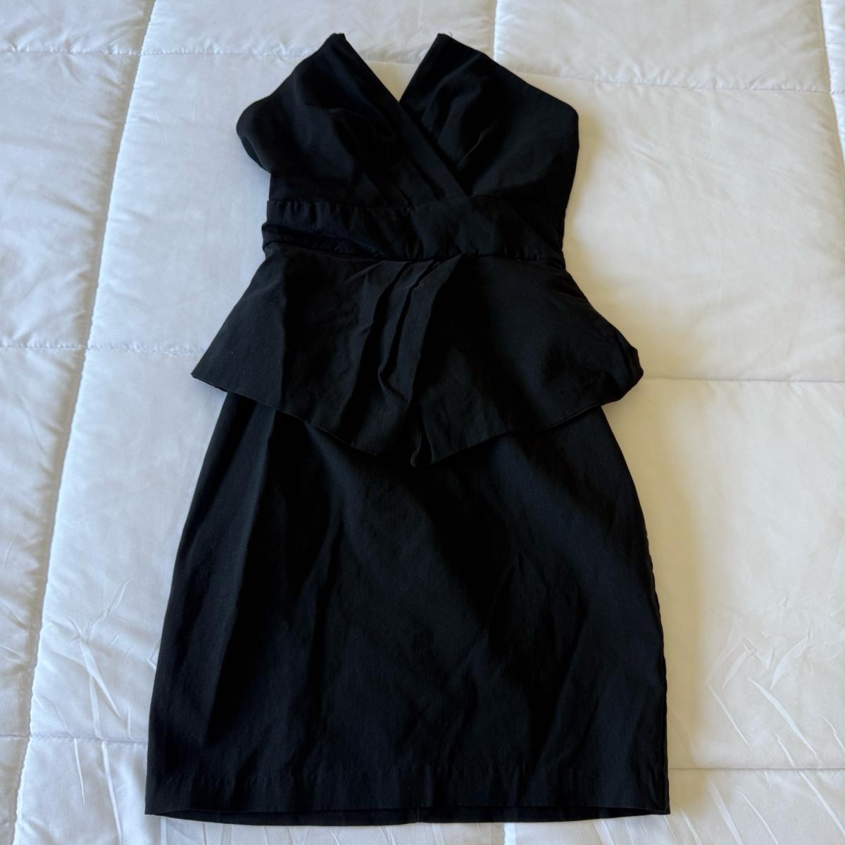 Elegant Strapless Black CorsetStyle Peplum Cocktail Dress