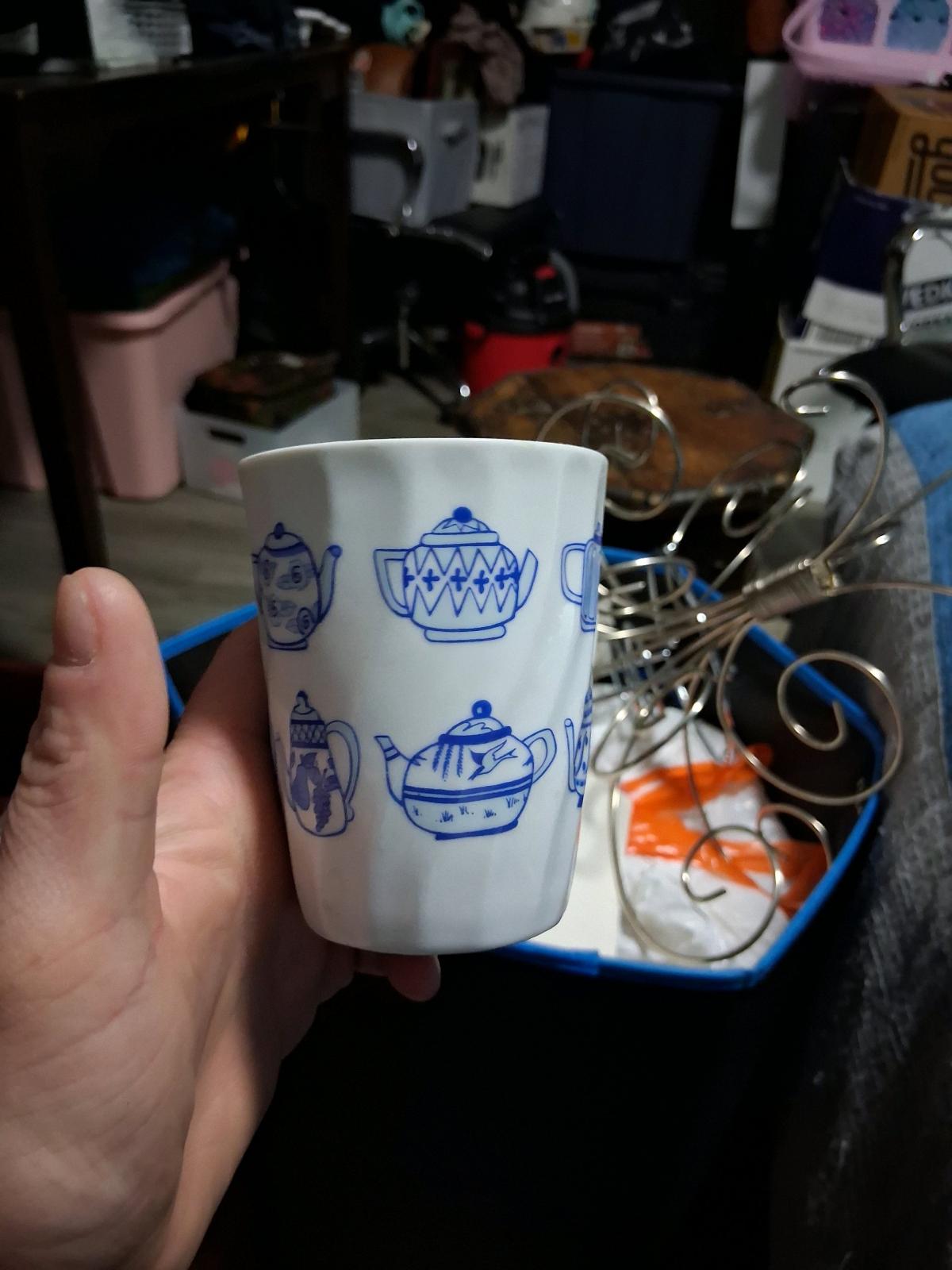 various vintage teapots and accesories