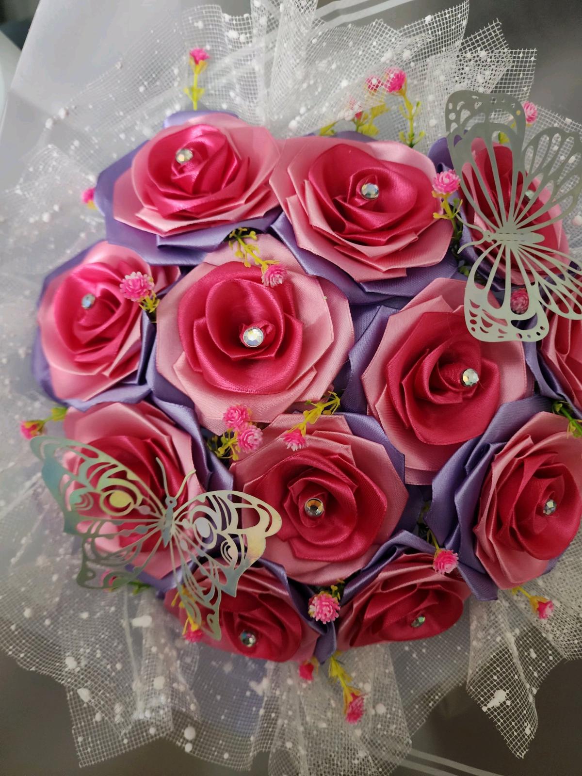 Pink and lavender satin ribbons roses bouquet