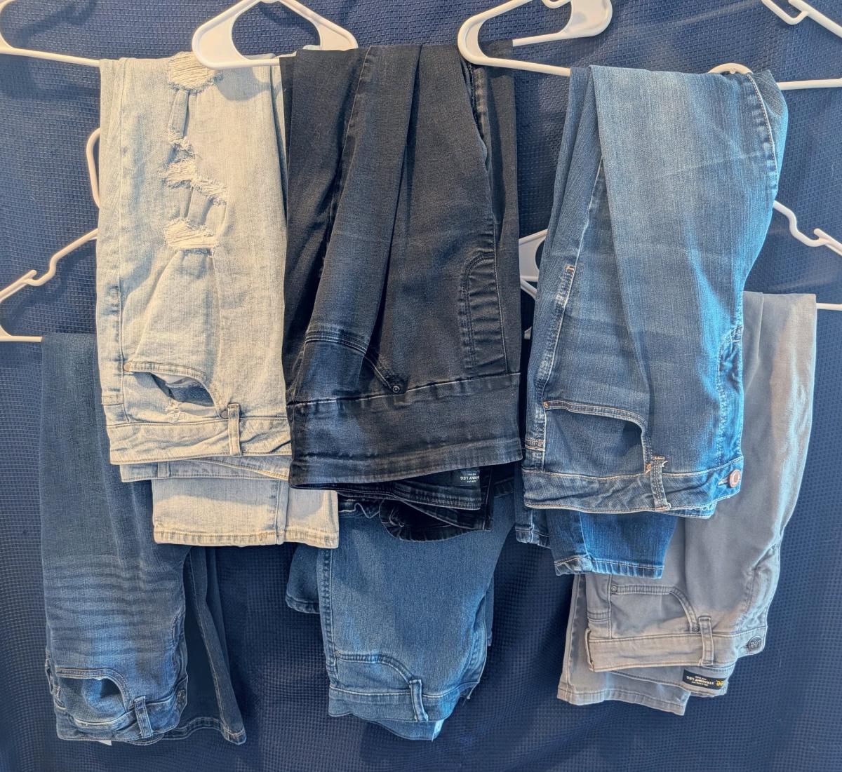lot of jeans various sizes
