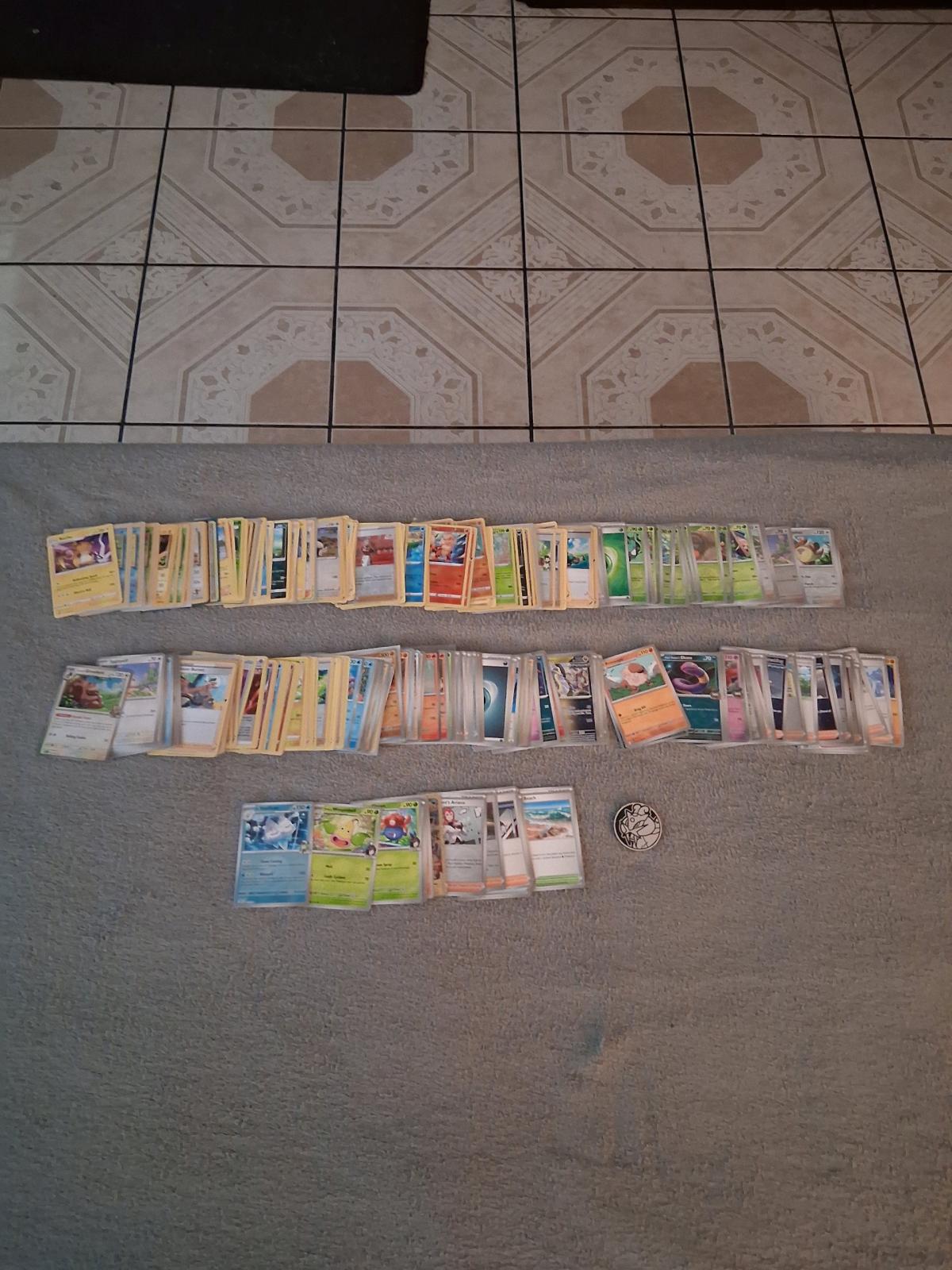 409 Pokemon Trading Cards with Tin And Holder Binders