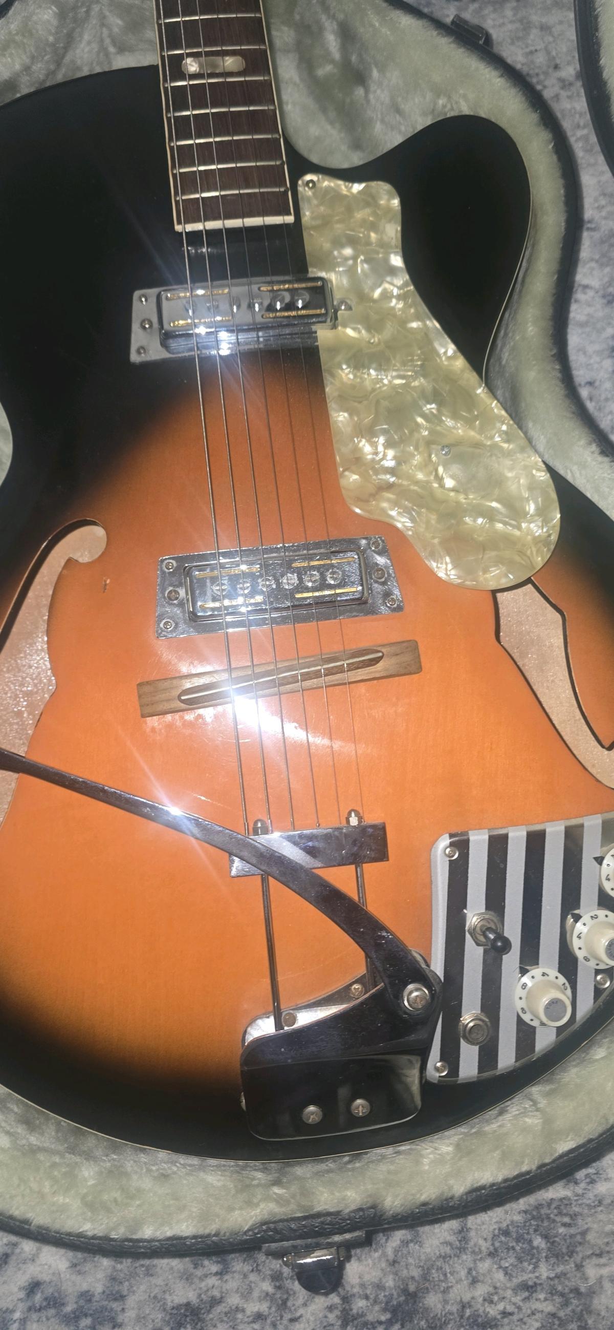 1960 Decca by Tiesco semicolon body guitar with case