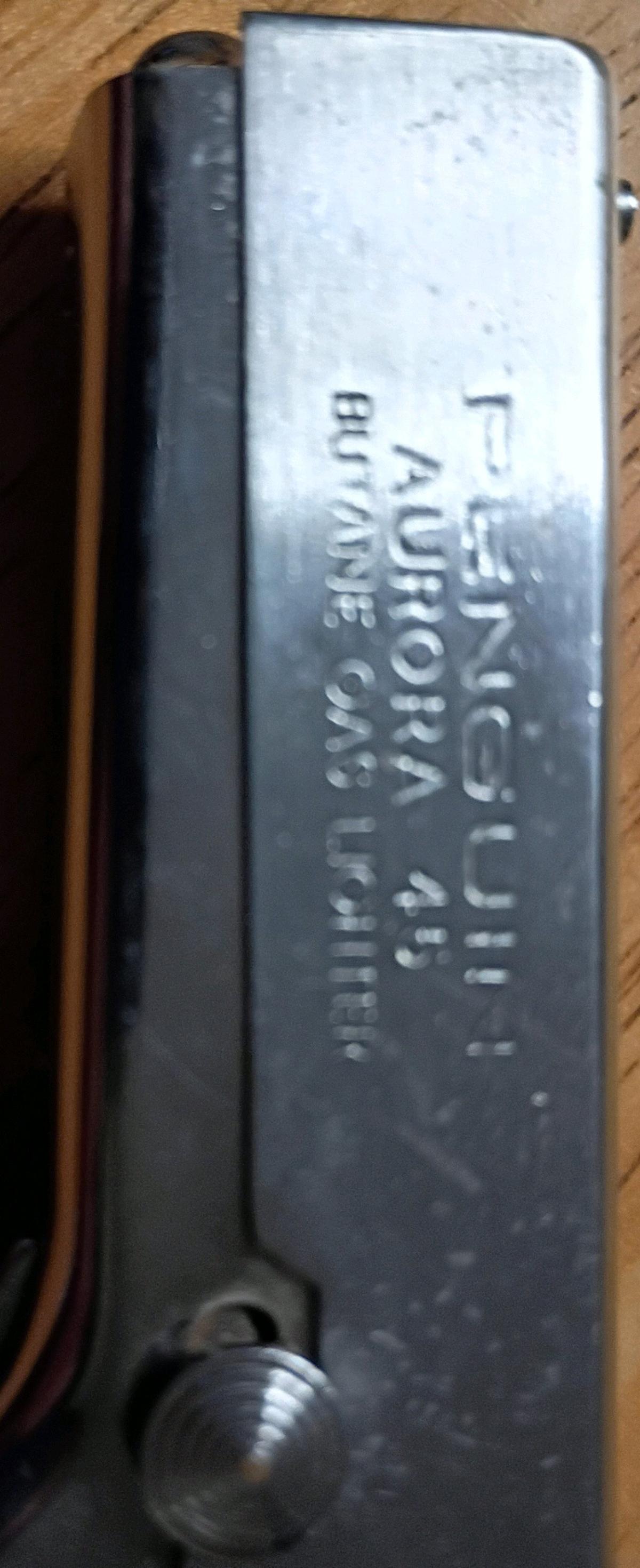 vintage Aurora penguin 45 gas lighter and flashlight combo