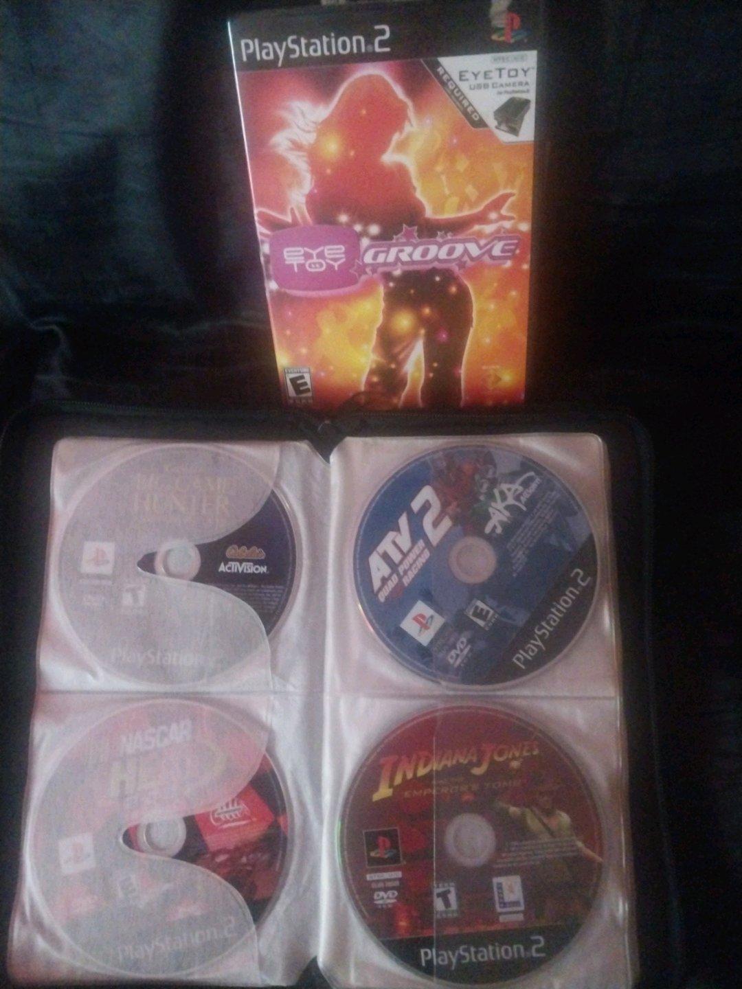 14 Playstation 2 games a code breaker disc and Xbox halo 2
