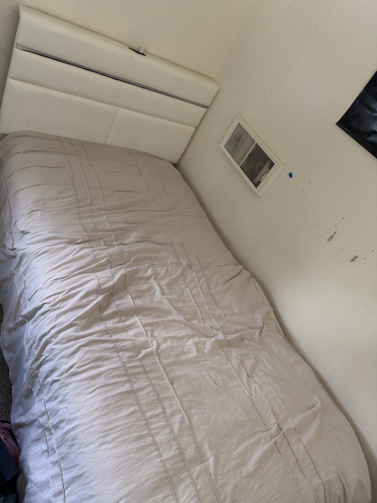 twin bed with mattress and frame